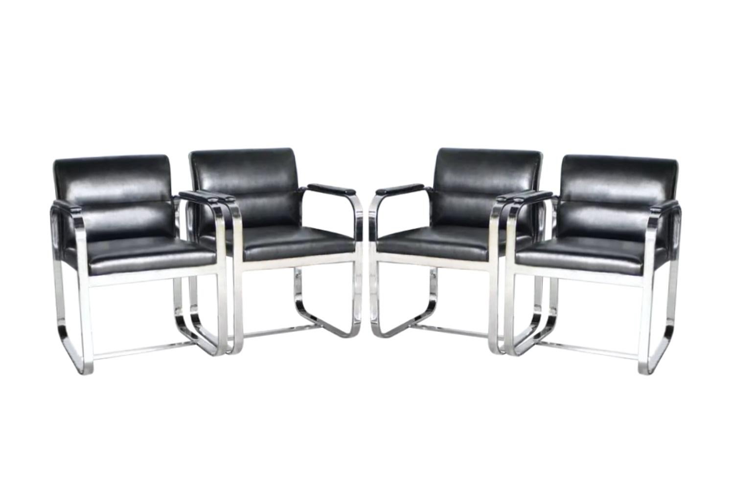 Handsome set of six (6) flat bar chromed steel dining chairs. These streamlined modernist chairs are the ultimate in luxurious comfort and a style that is very characteristic of Milo Baughman, circa 1960. With soft curves and daring angles, is a
