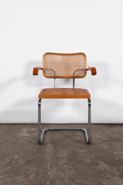 Set of six chrome, wood and rattan Cesca dining chairs, circa 1960.