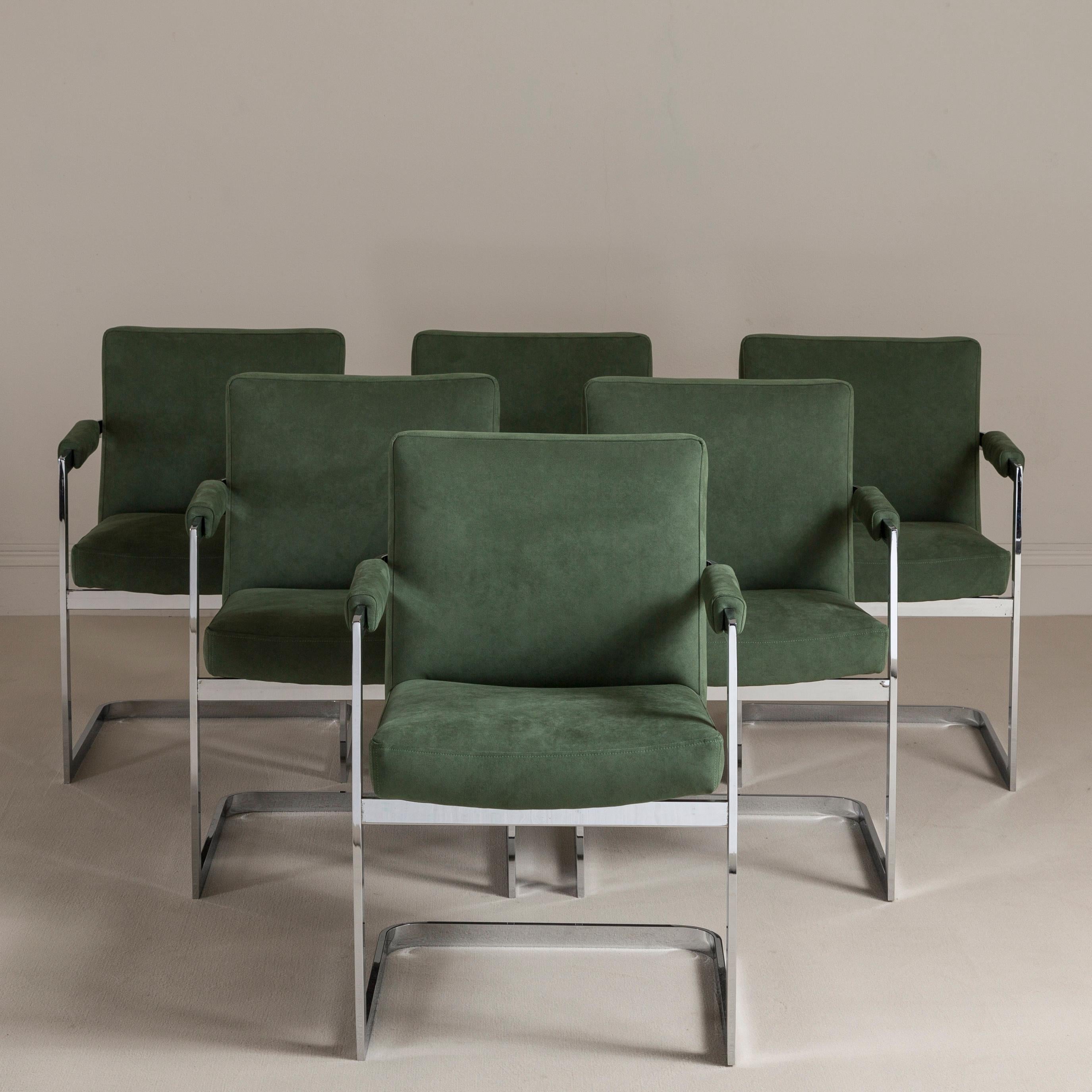 A set of six chromium steel cantilevered dining/armchairs, upholstered in a deep green alcantara including the armpads 1970s.

These chairs have a sleek mid century modern design and are very comfortable dining chairs. 


  