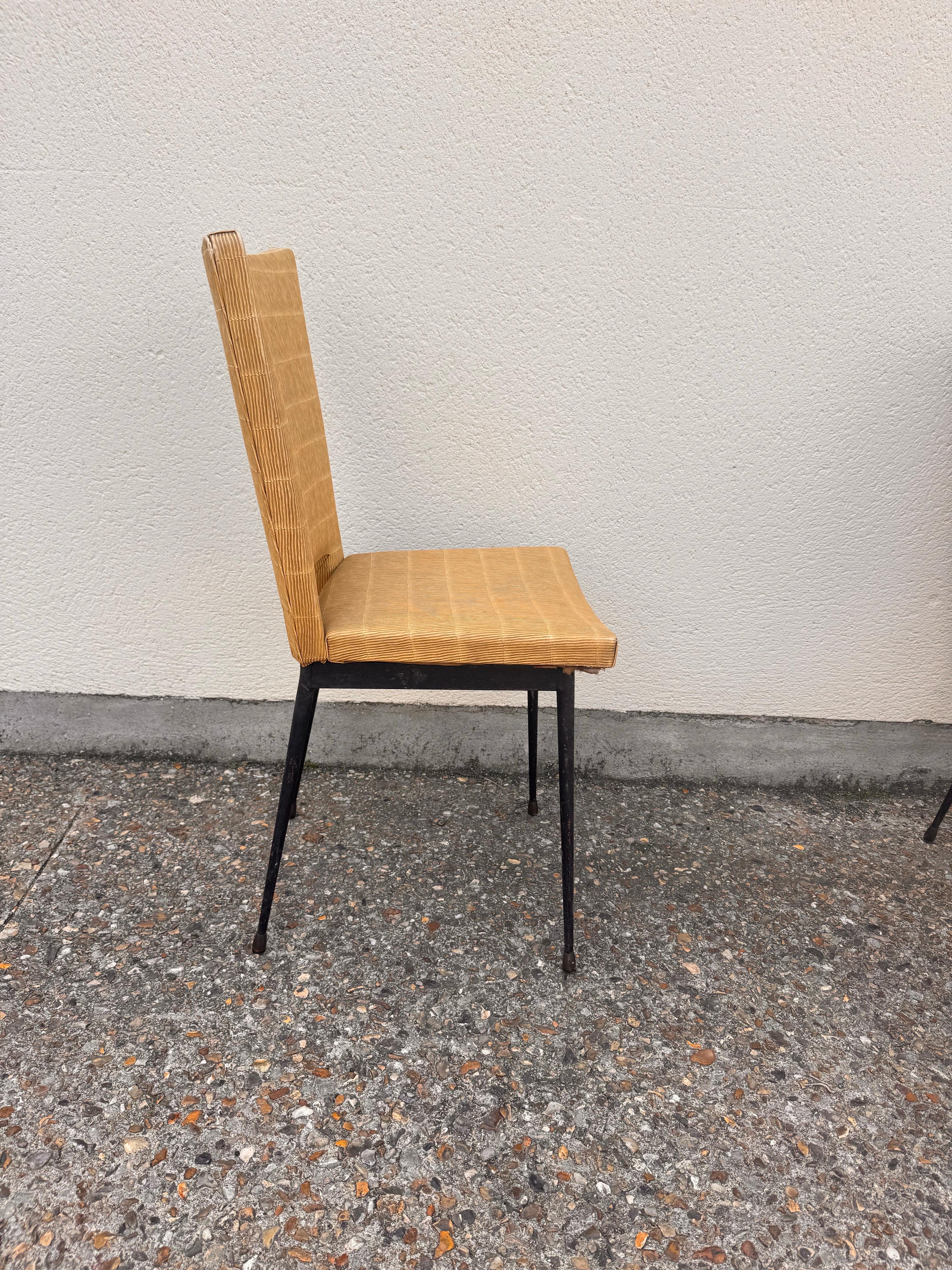 Set of six yellow chair in leatherette from the fifties by Colette Gueden and black metal for the base