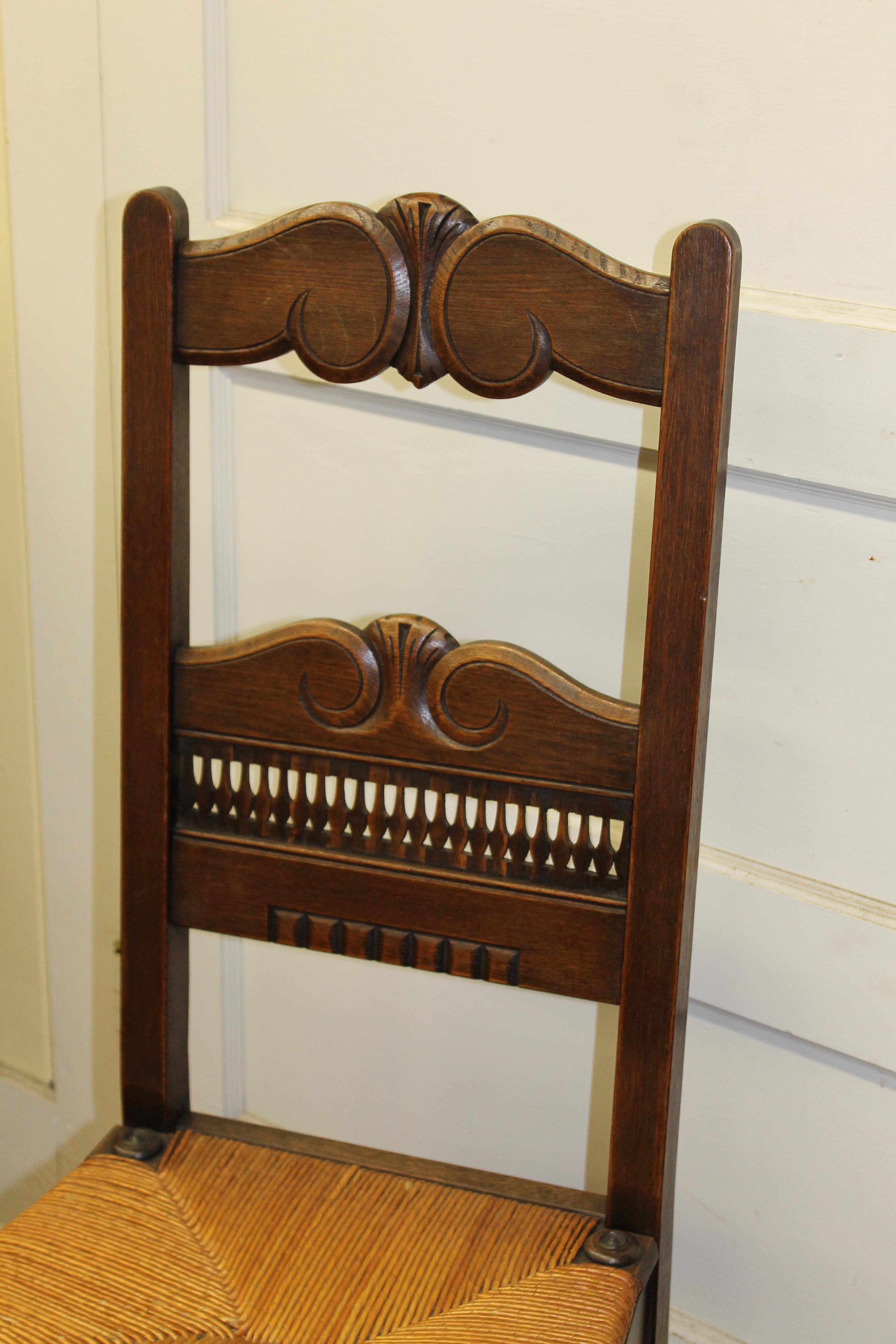 Set of Six Country French Hand-Carved Solid Oak Rush Seated Dining Chairs In Excellent Condition In Charleston, SC