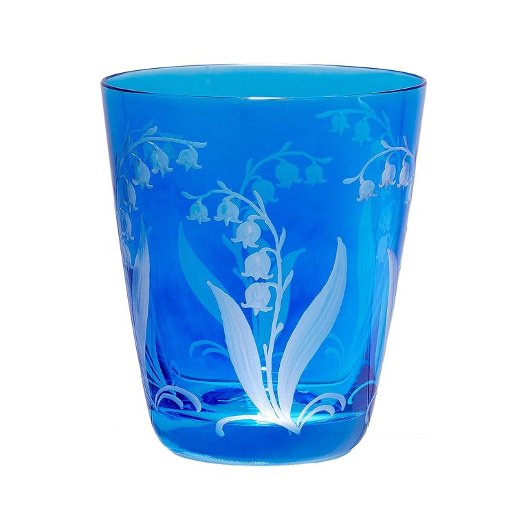 Set of six hand blown tumbler in blue crystal with a hand-edged country style decor. The decor shows a hand-engraved decor lily of the valley all-over the glass. Handmade in Bavaria/Germany. Can be ordered in different colors. Colored crystal is not
