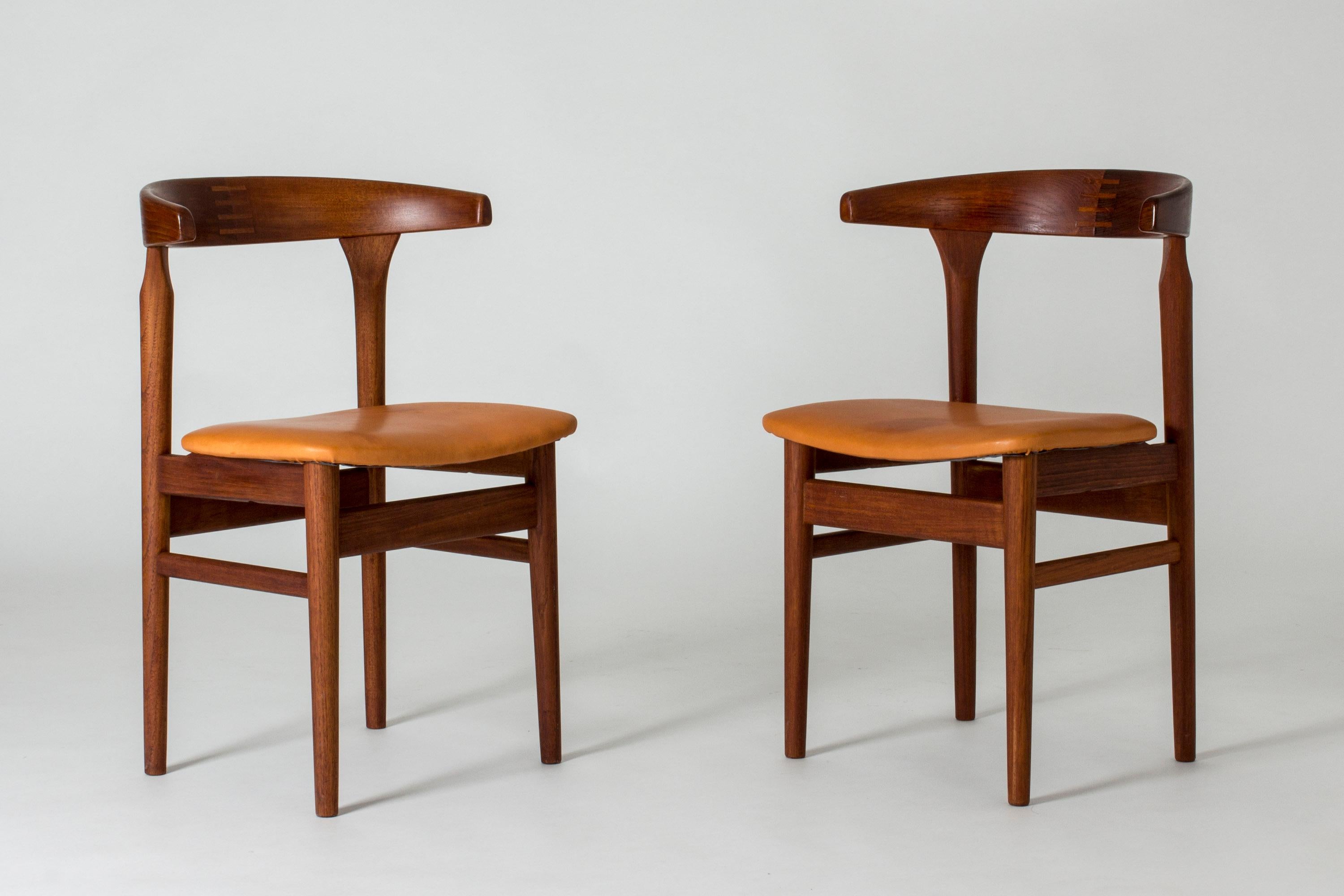 Set of six amazing “cowhorn” chairs by Torbjørn Afdal. Made from teak with beautiful details. Seats upholstered with patinated natural leather, vegetable tanned and of very high quality.