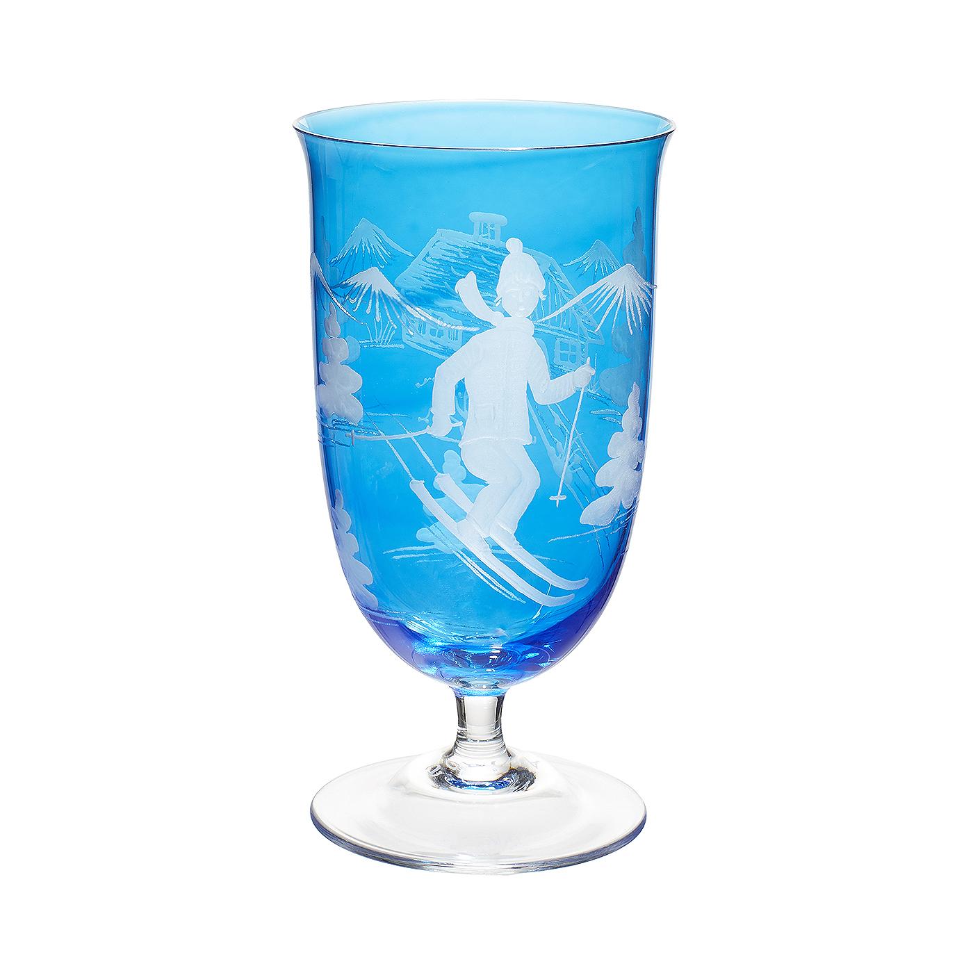 Set of six hand blown glasses in blue crystal with a hand-edged skier decor in the country style. The decor is a modern scene, showing a skier boy, trees and mountains and a chalet all-over the glass. All Sofina glasses are hand blown and engraved
