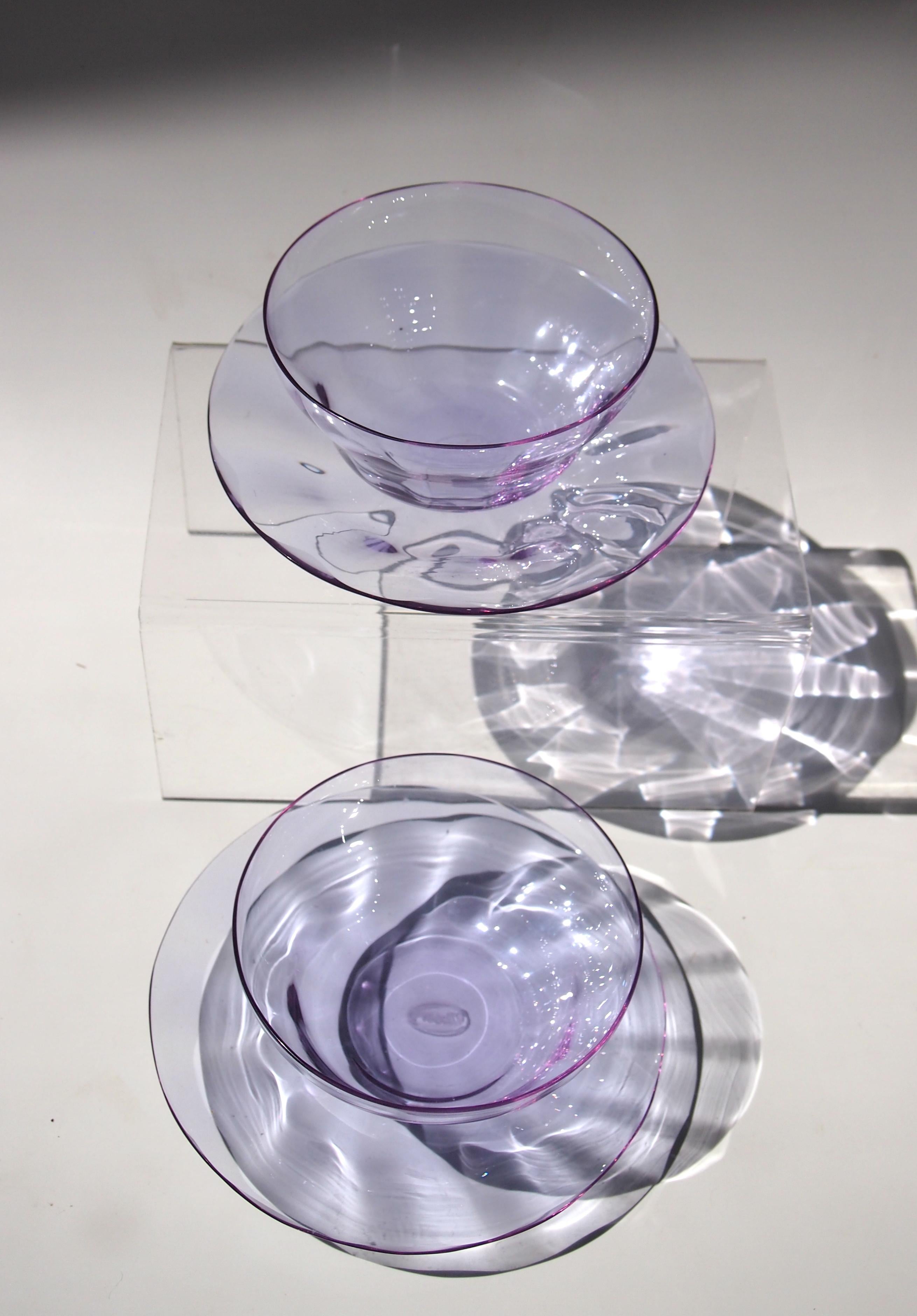 Amazing full set of six Art Deco optically ribbed bowls and plates by Moser in the unusual color 'Alexandrit', circa 1929. 'Alexandrit' has the ability to change colour dramatically (pink to blue) depending on the frequency of the light in the room.