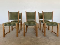 Set of six Danish Brutalist dining chairs crafted in solid oak, Denmark, 1960s.