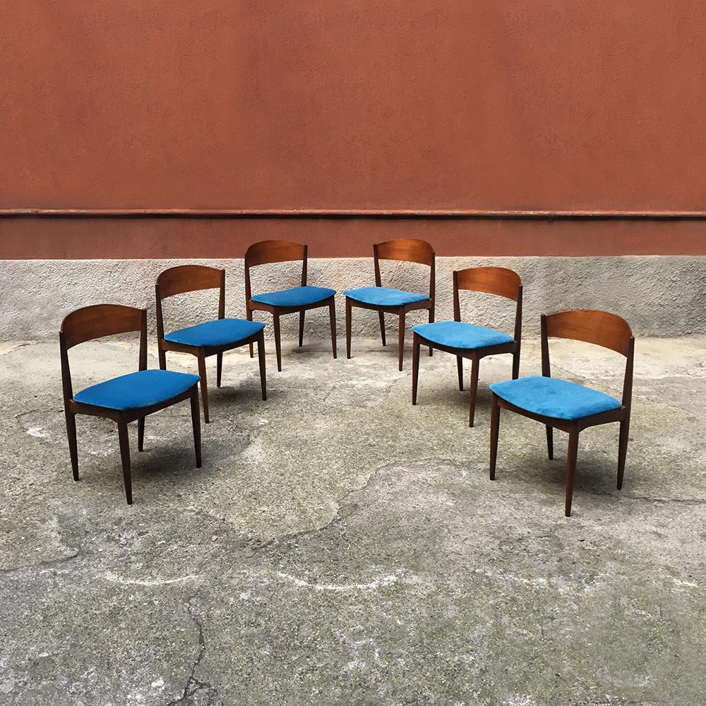 Set of six Danish dining chairs in azure velvet dating to the 1960s, with seat covered in new azure velvet, structured in curved solid blonde teak and turned legs, completely restored.