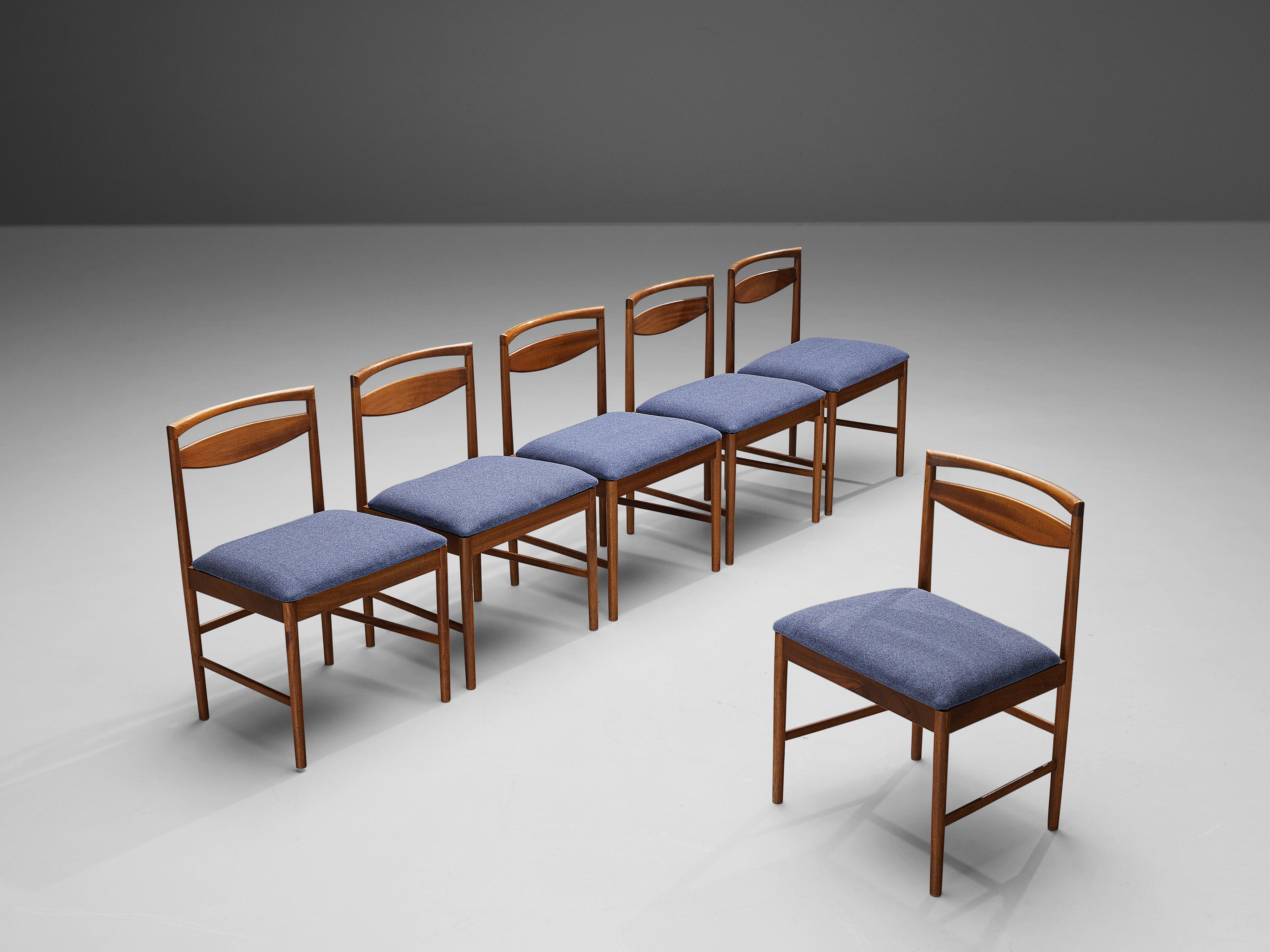 Set of six dining chairs, teak, fabric, Scotland, 1960s. 

Stunning set of dining chairs with striking backrests. The model is angular and modest as it is build up in mainly horizontal and vertical lines. Only the backrest is curved and frames a