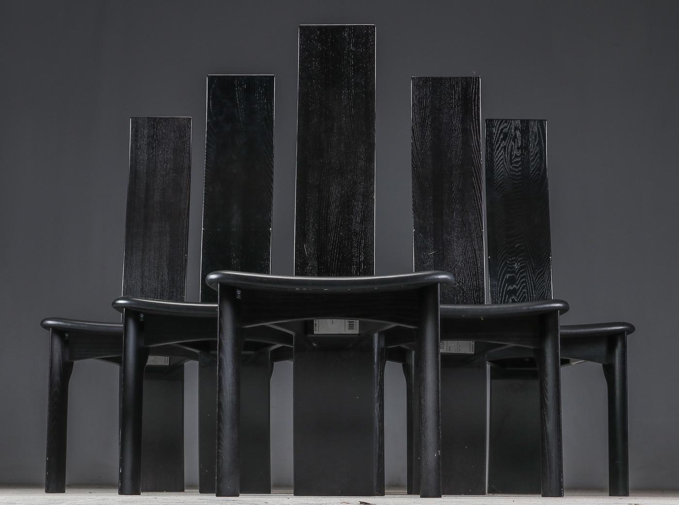 A set of six Danish ebonized dining chairs. Designed 1970 by Bob og Dries van den Berghe for Tranekær Mobler. 
Another set of eight with beige seat in other listing. 