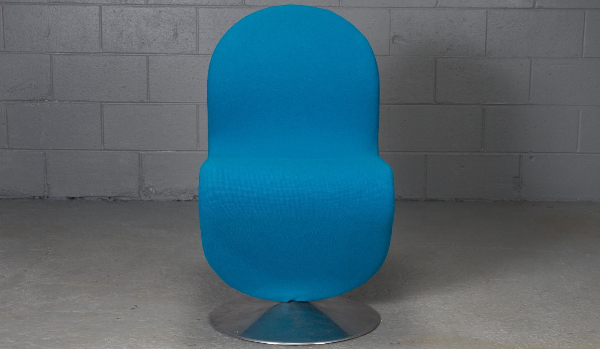 These striking chairs were designed in the 1950s by Verner Panton for Fritz Hansen in Denmark. The 1-2-3 chairs are upholstered in a bright blue fabric, and sold as a set of six.