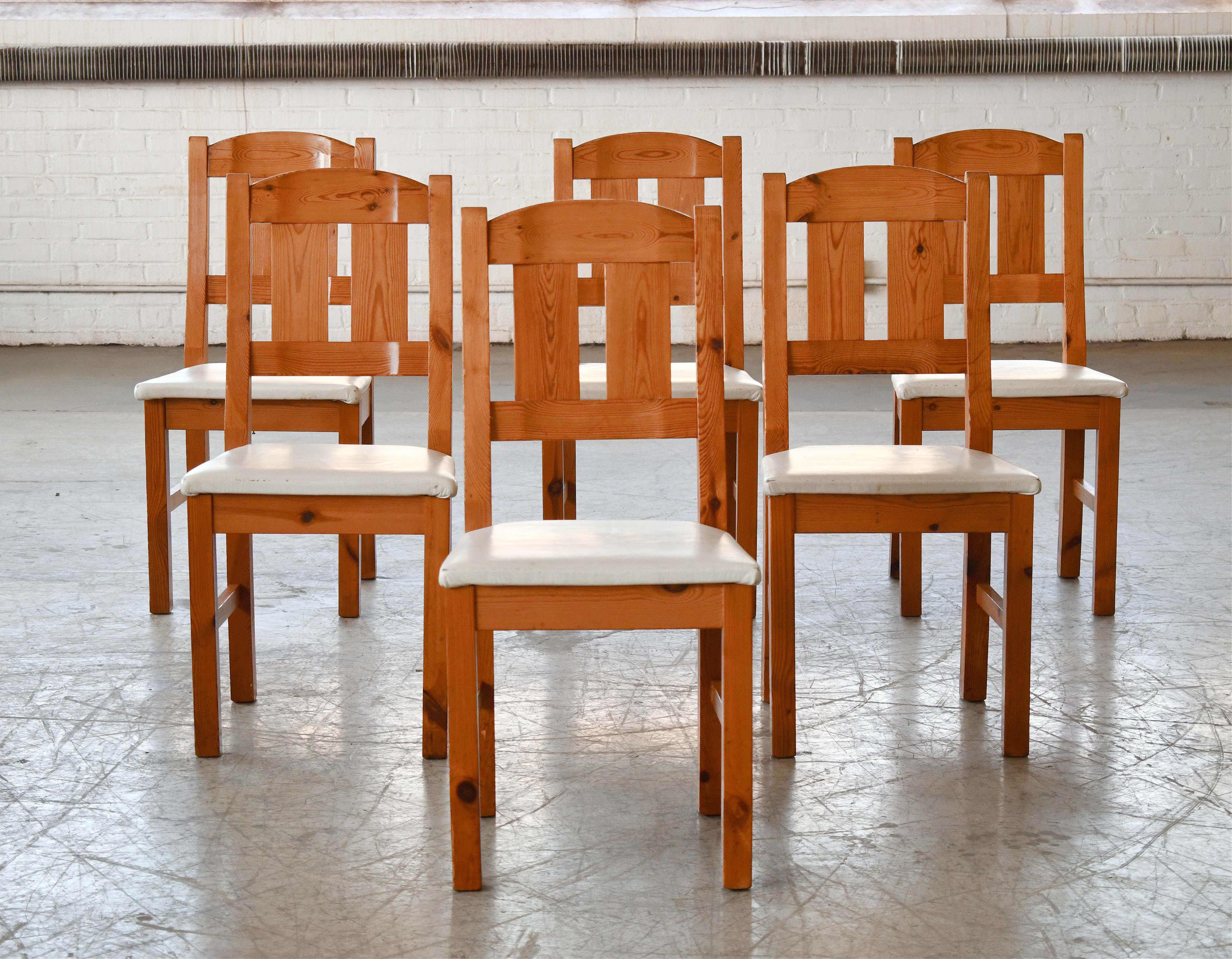 Great Danish dining chairs made sometime in the 1930's. Rustic and very elegant in their simplicity very reminiscent of the famous chairs made by Kaare Klint at the peak of functionalism.  Made from oak and the seats have been reupholstered in a