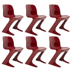 Used Set of Six Dark Red Wine Kangaroo Chairs Designed by Ernst Moeckl, Germany, 1968