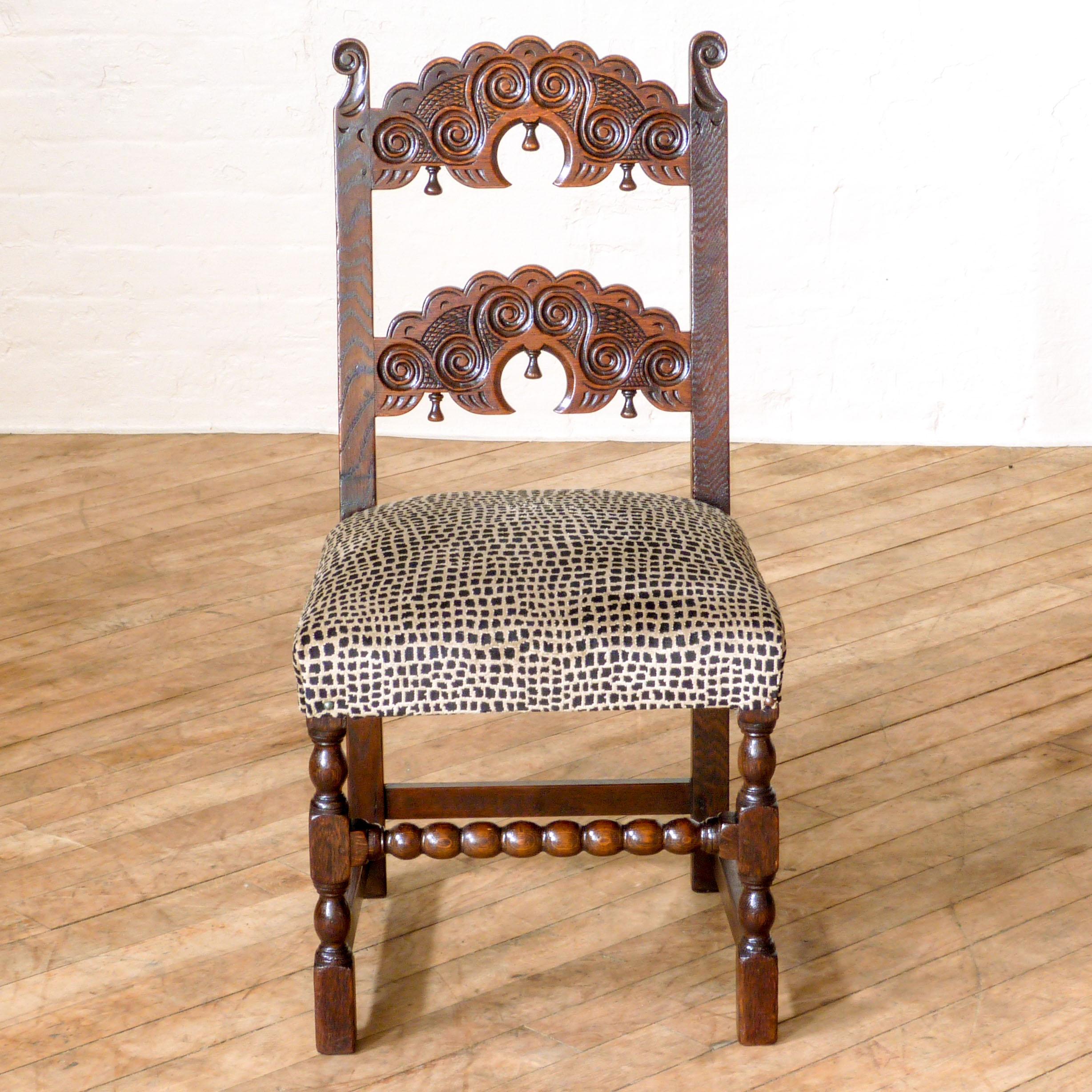 Set of six Derbyshire style oak chairs in the 17th century manner circa 1920 all in very good and sound condition. All the chairs have been reupholstered in a velvet animal print. A very unique set.
   