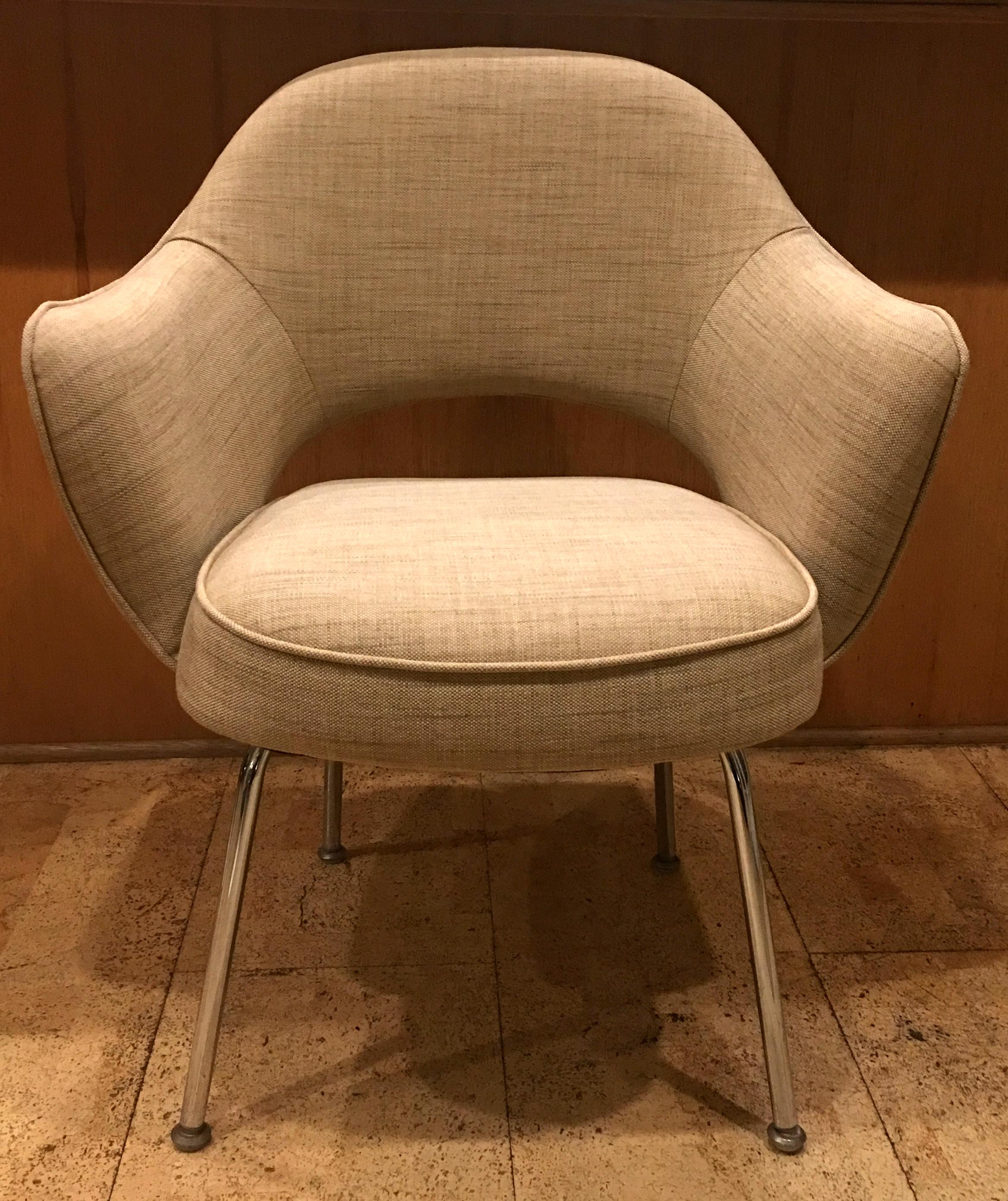 Set of six executive armchairs by Eero Saarinen for Knoll. The chairs are in virtual Mint condition and have been freshly reupholstered in a handsome Tan cotton/linen(look) Sunbrella fabric.  