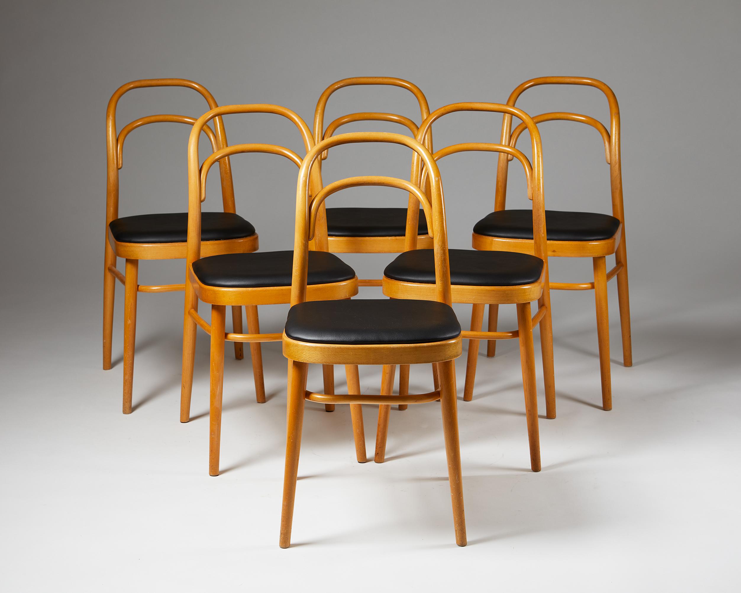Set of six dining chairs, Anonymous
Sweden, 1990's

Lacquered beech and black gallon leather.

Measurements:
H: 83 cm / 32 ¾’’
SH: 49 cm / 18 ¾’’
W: 40 cm / 15 ¾’’
D: 53 cm / 20 ½’’
