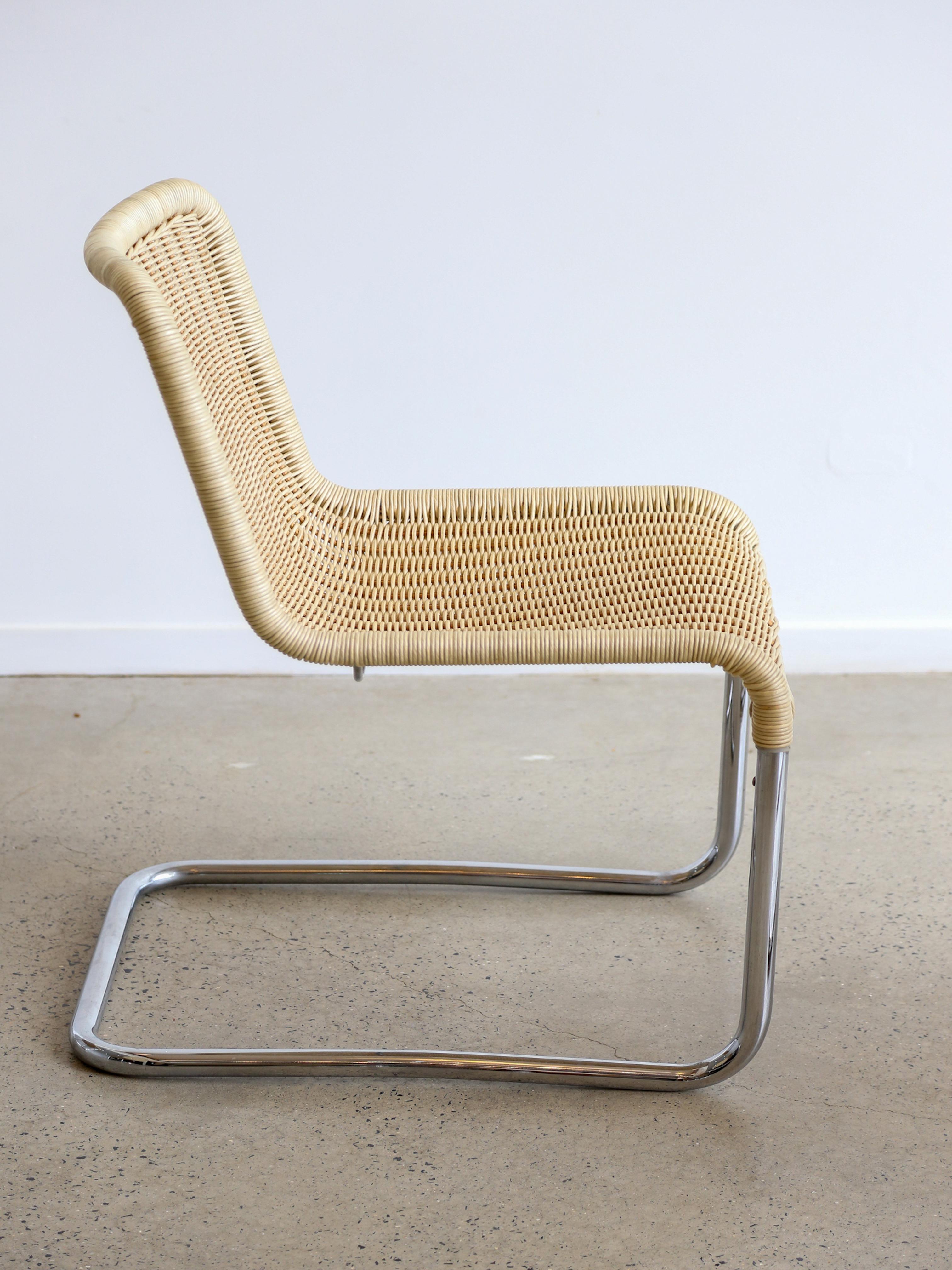 A pair of armchairs by German manufacturer Tecta from 1970s. Tecta is a manufacturer of furniture designed among others by Jean Prouve and Marcel Breuer. The frame is made of chrome-plated steel tubes, which is wound around a braided backrest in the