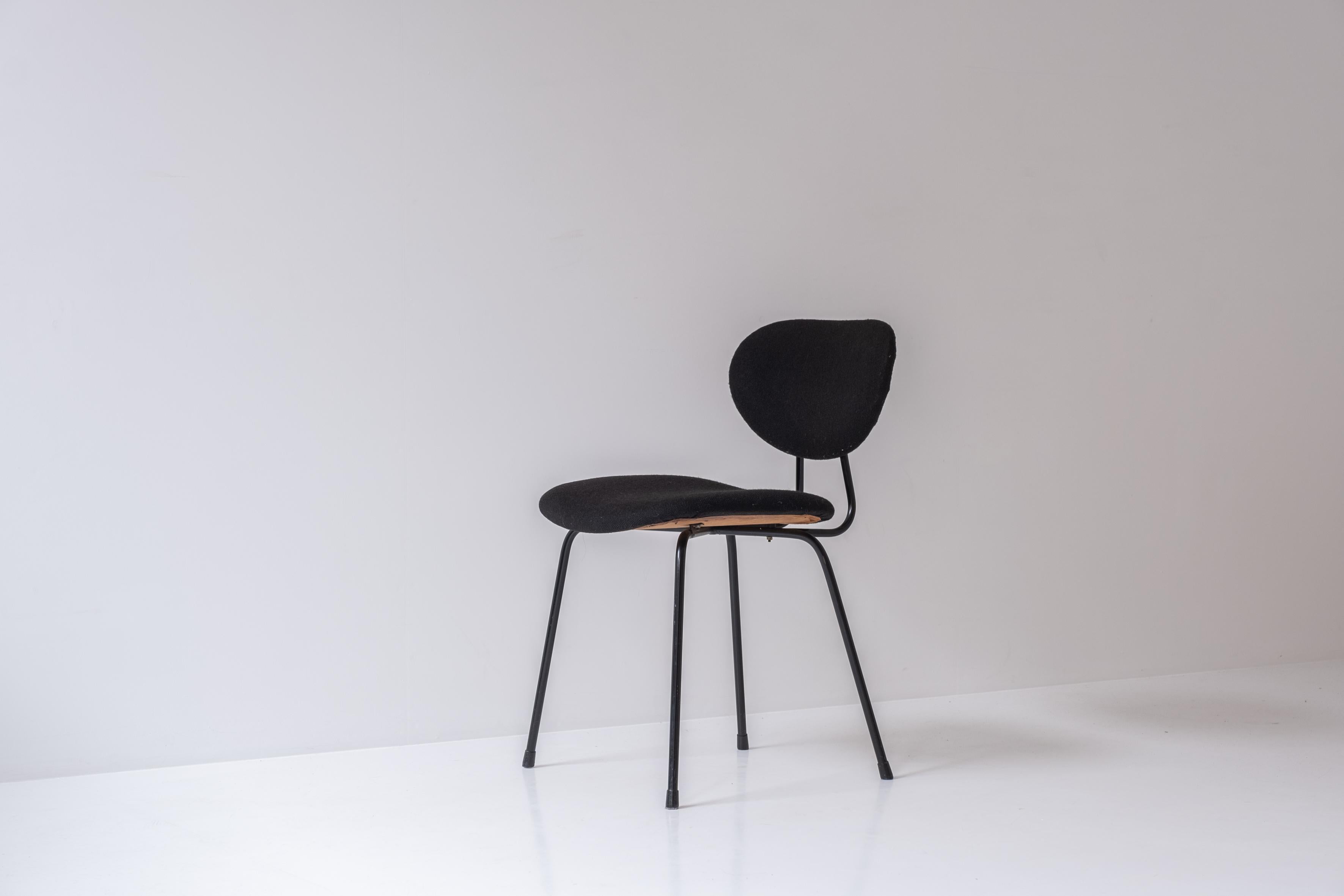 Set of six dining chairs by Florence Knoll for Knoll International, USA 1960s. These chairs features black lacquered steel bases with a black wool fabric upholstered seats and backs. Well presented and original condition.