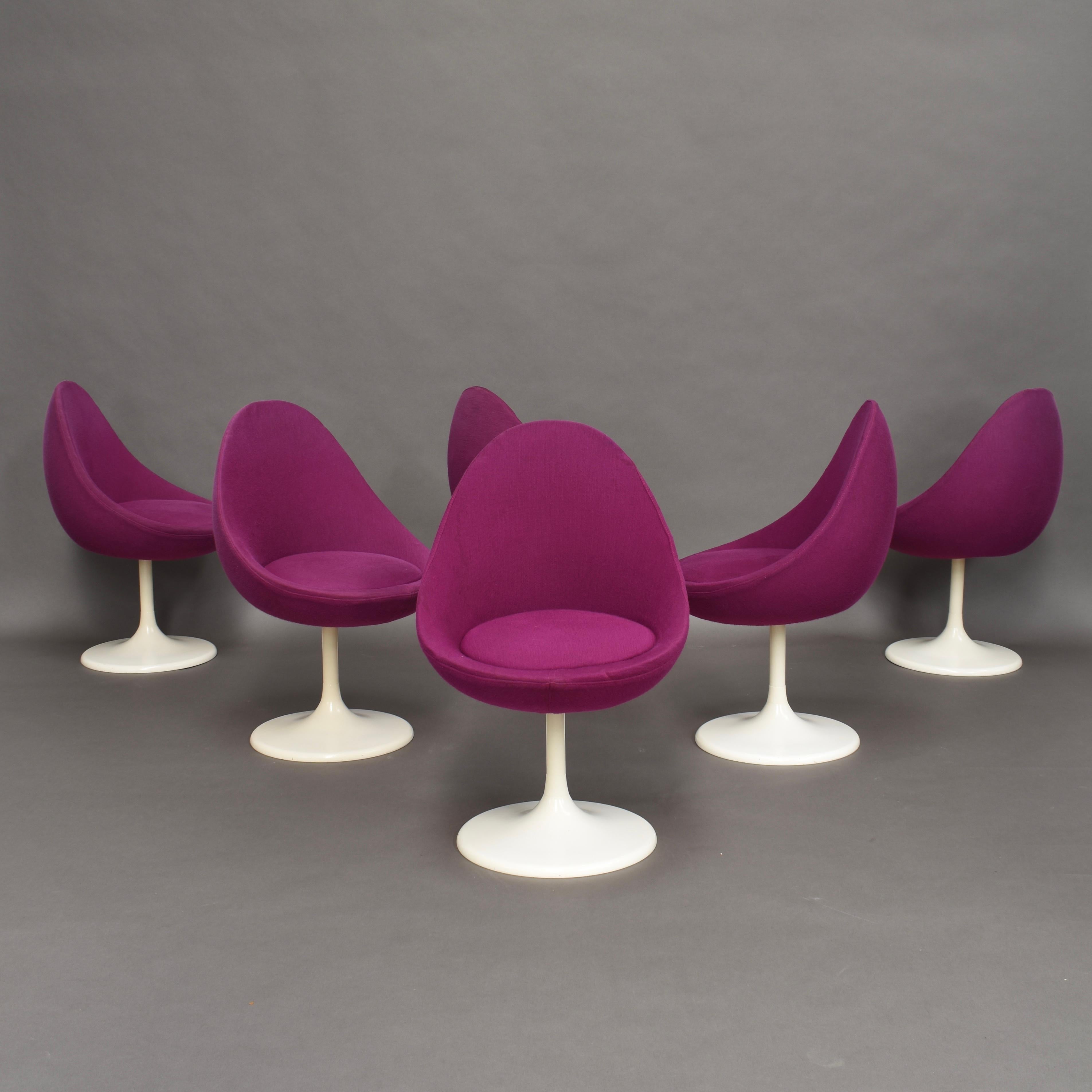Rare set of six dining chairs attributed to Joe Colombo for Lusch Erzeugnis – Germany, circa 1970.

The chairs have a swivel function with a metal leg and a hardplastic foot. The ‘egg’ seat is made of polystyrene foam and is covered in a purple