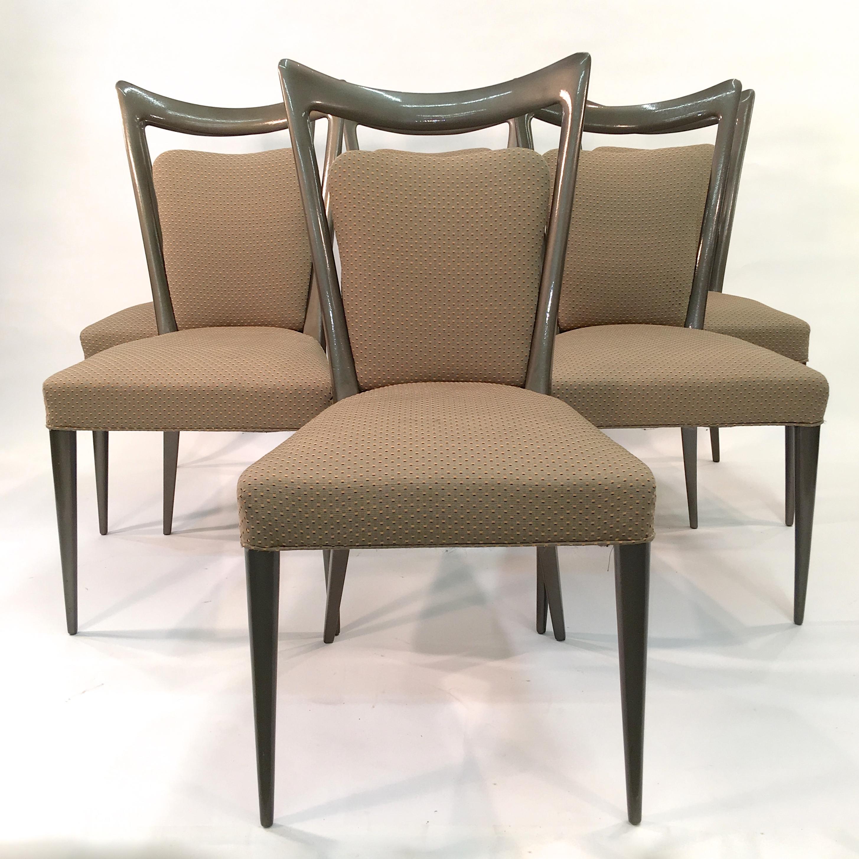 Set of six dining chairs designed by Melchiorre Bega in collaboration with Mario Gottardi and imported from Italy in the early 1950s by Fabry Associates.

The chairs have been lacquered a dark taupe which the color detection app on my phone says