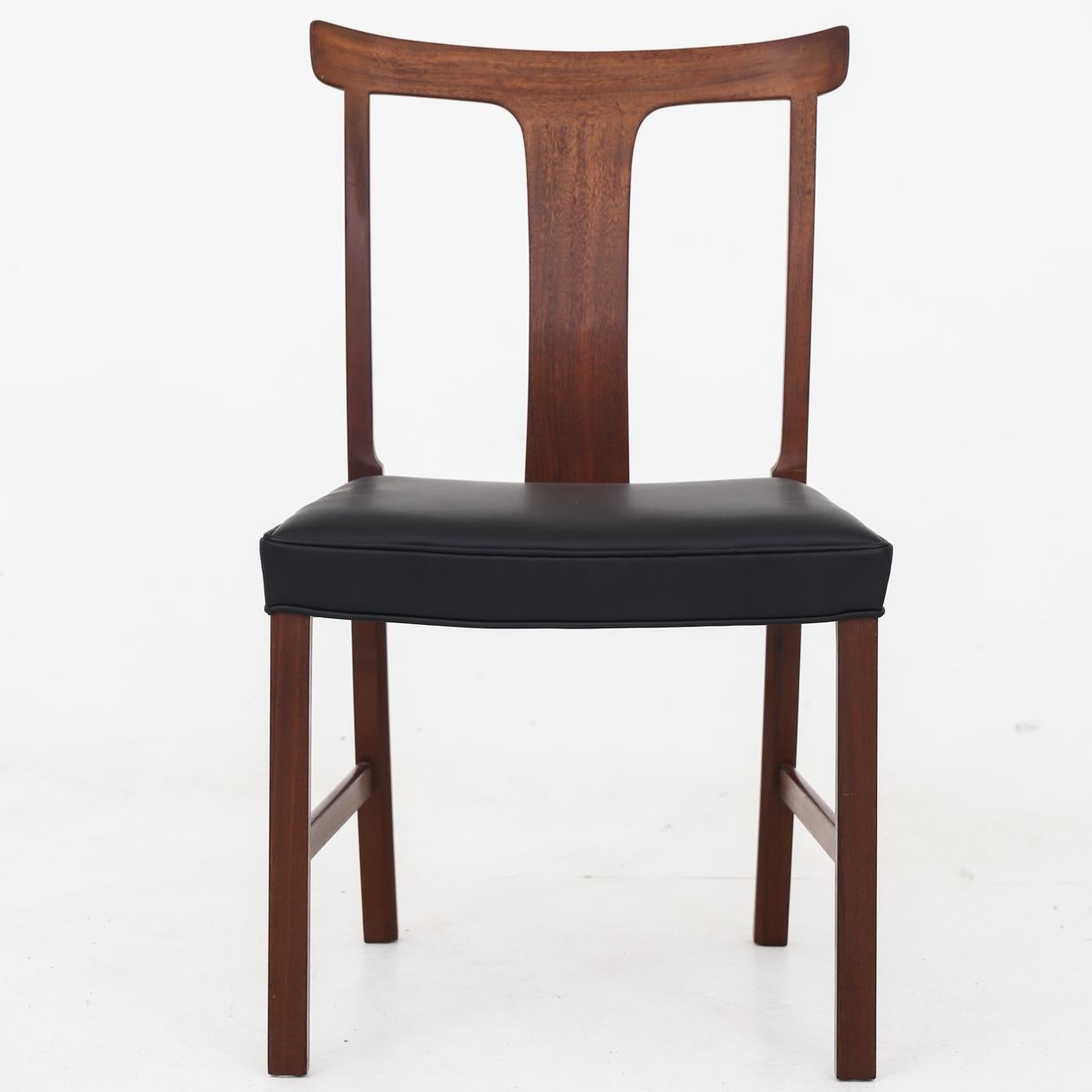 Set of six 'Benedikte' dining chairs in mahogany with new black 'Elegance' aniline leather. Ole Wanscher / A.J Iversen.