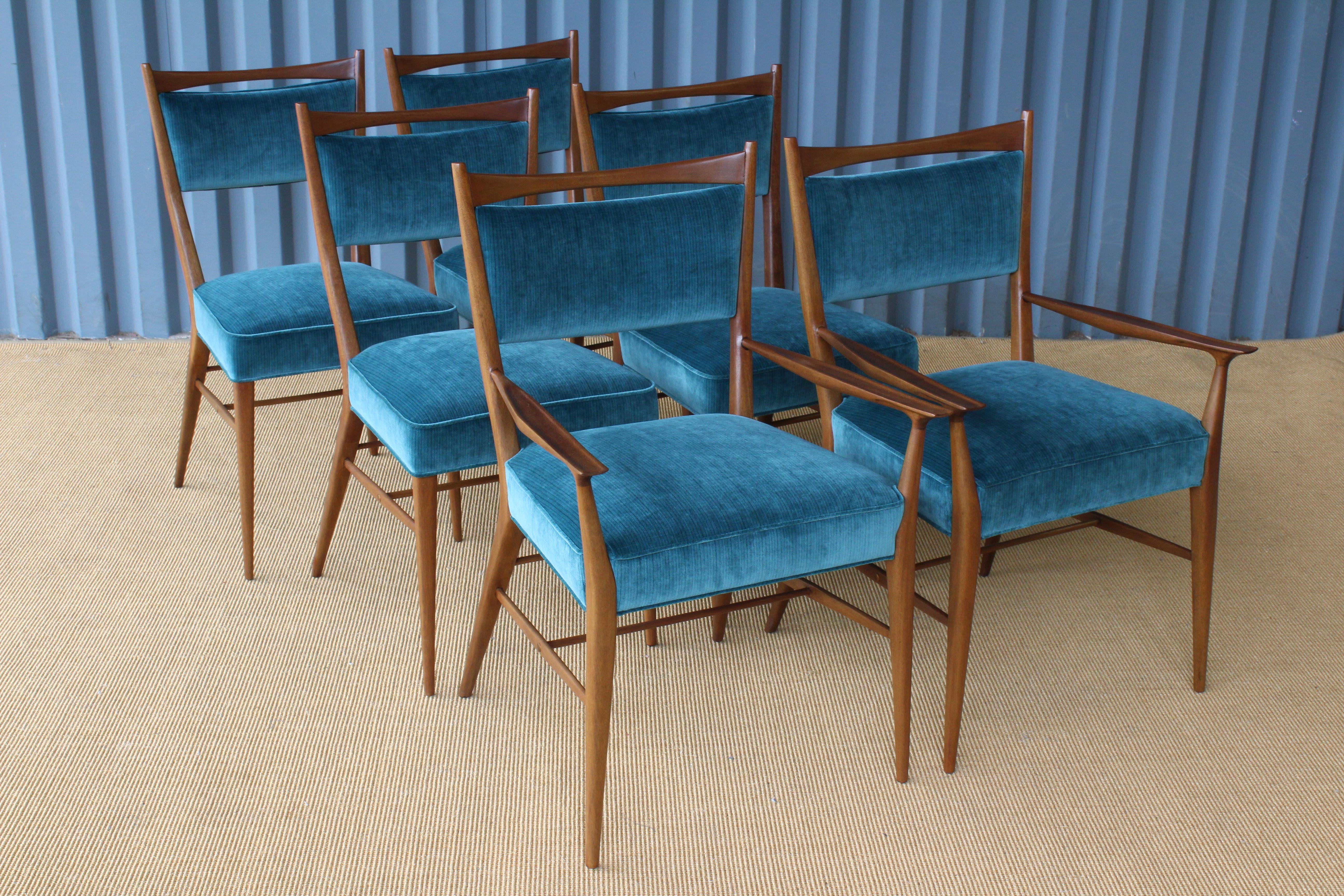 Set of six mahogany dining chairs designed by Paul McCobb for Directional. All chairs have been professionally refinished and feature new velvet upholstery.