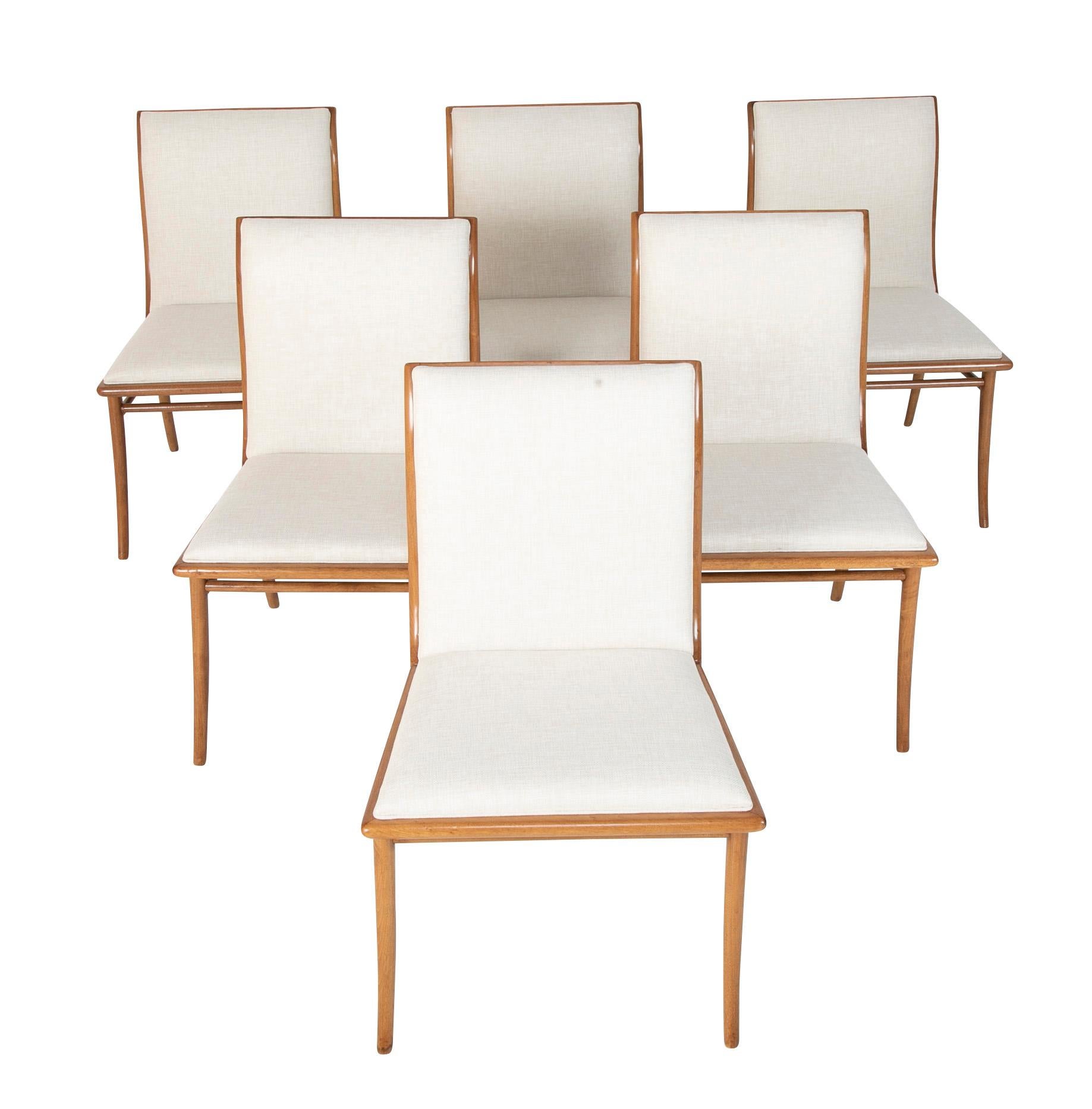 A wonderful set of six bleached mahogany dining chairs by T. H Robsjohn-Gibbings.