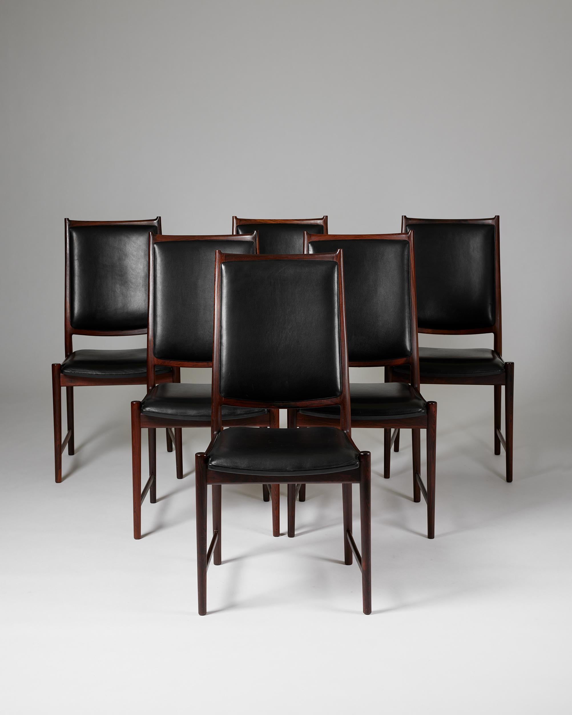 Satz von sechs Esszimmerstühlen 'Darby', entworfen von Torbjörn Afdal für Bruksbo,
Norwegen, 1960er Jahre.

Palisanderholz und Leder.

Gestempelt.

H: 96 cm
B: 47,5 cm
T: 58 cm 
SH: 45 cm