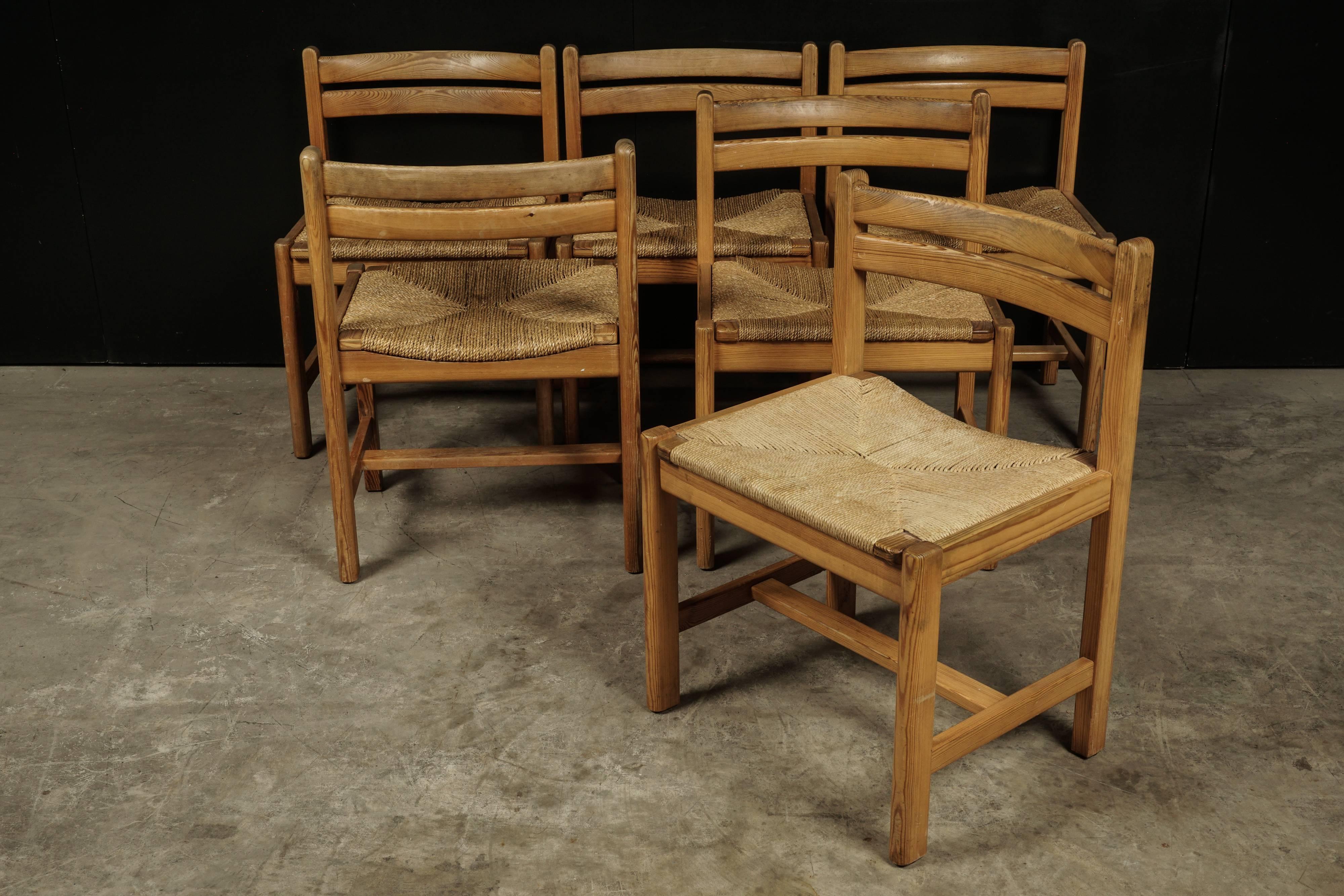 Set of six dining chairs designed by Børge Mogensen, Denmark, circa 1970. Woven paper cord seats on a pine frame. Nice original wear and patina.