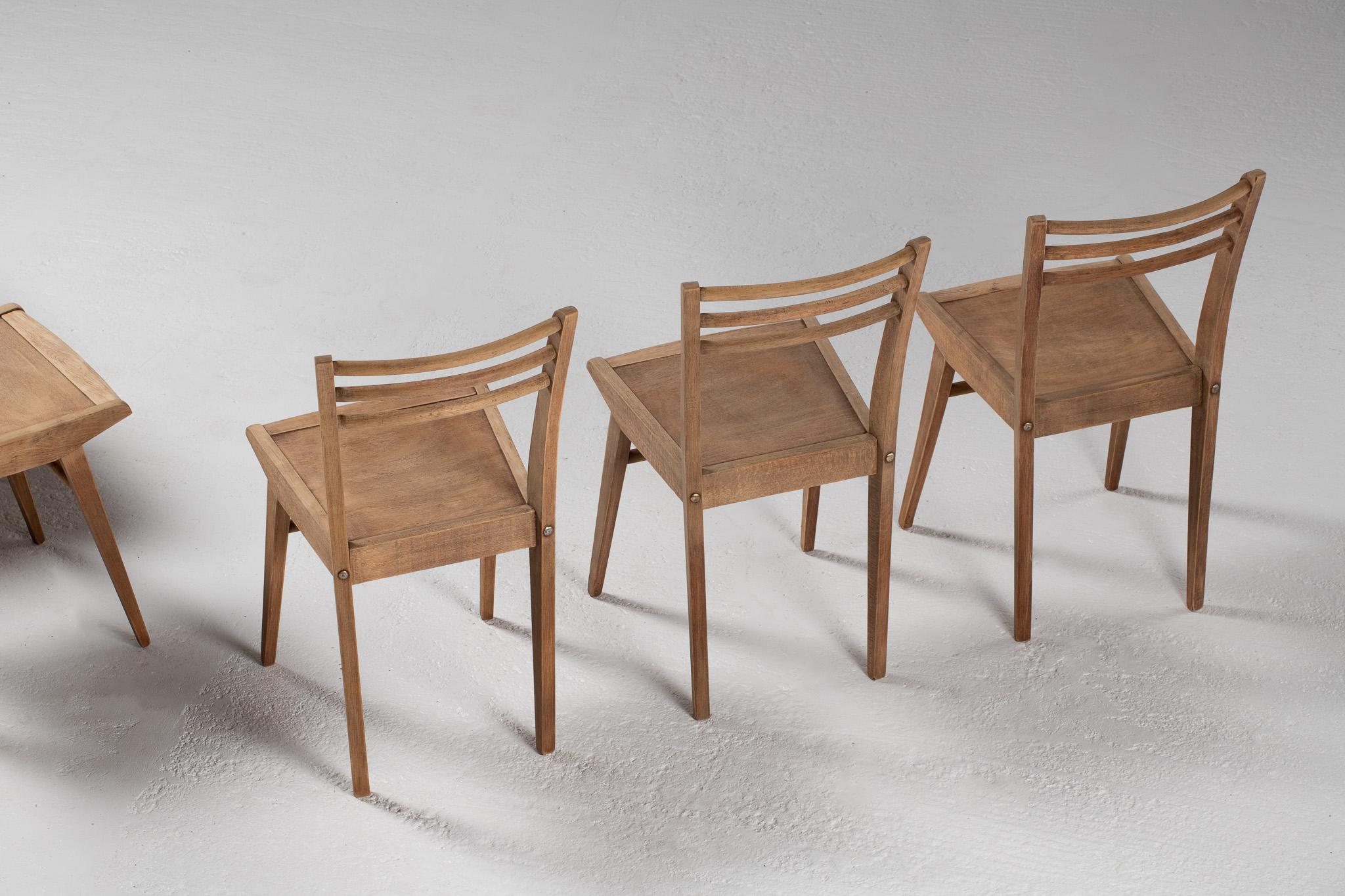 Juego de seis sillas de comedor, Francia, años 50 en venta 11