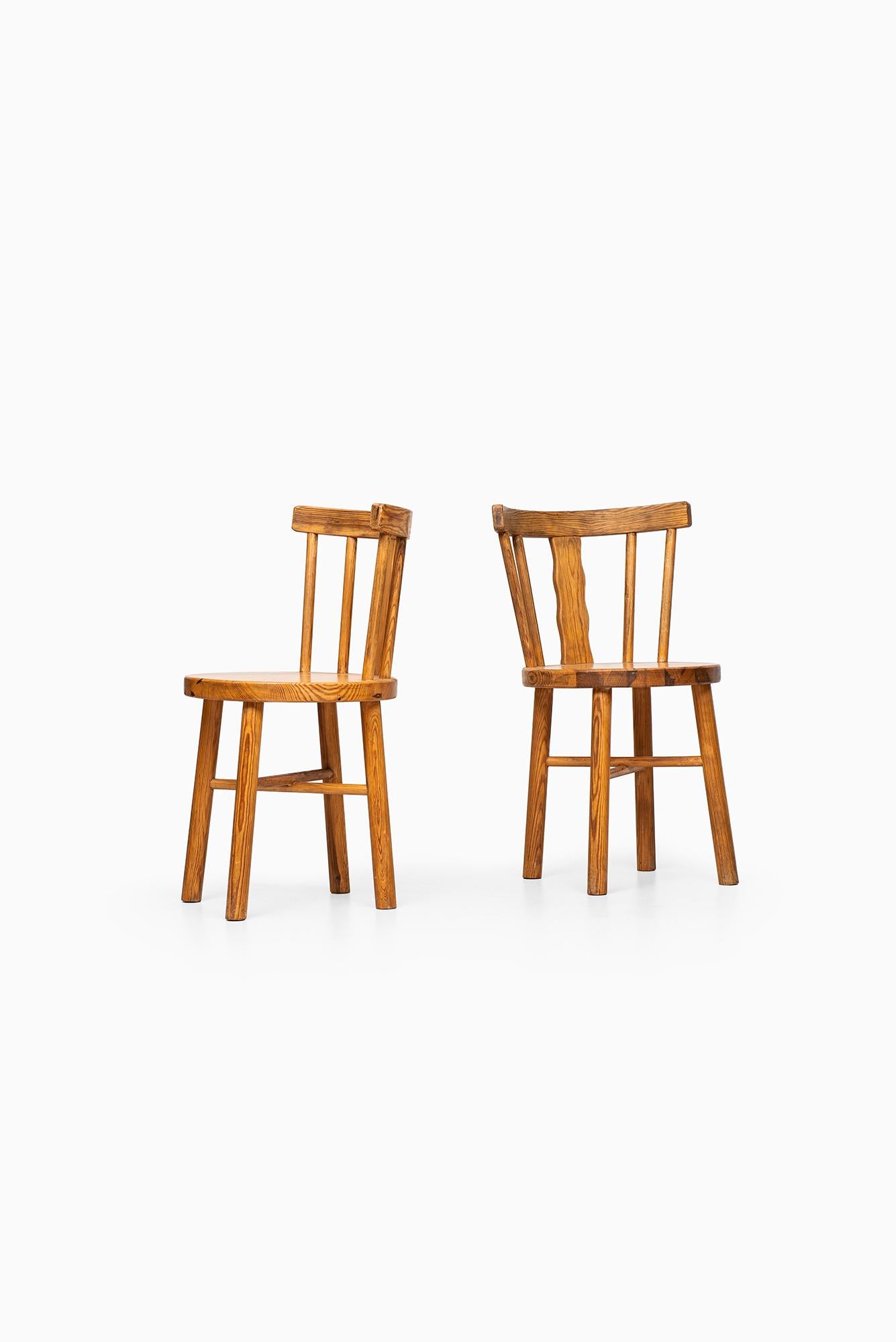 Set of six dining chairs in pine produced in Sweden.