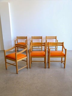 Set of Six Dining Chairs in Rosewood & Orange Leather Cushions