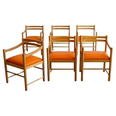 Set of Six Dining Chairs in Rosewood & Orange Leather Cushions