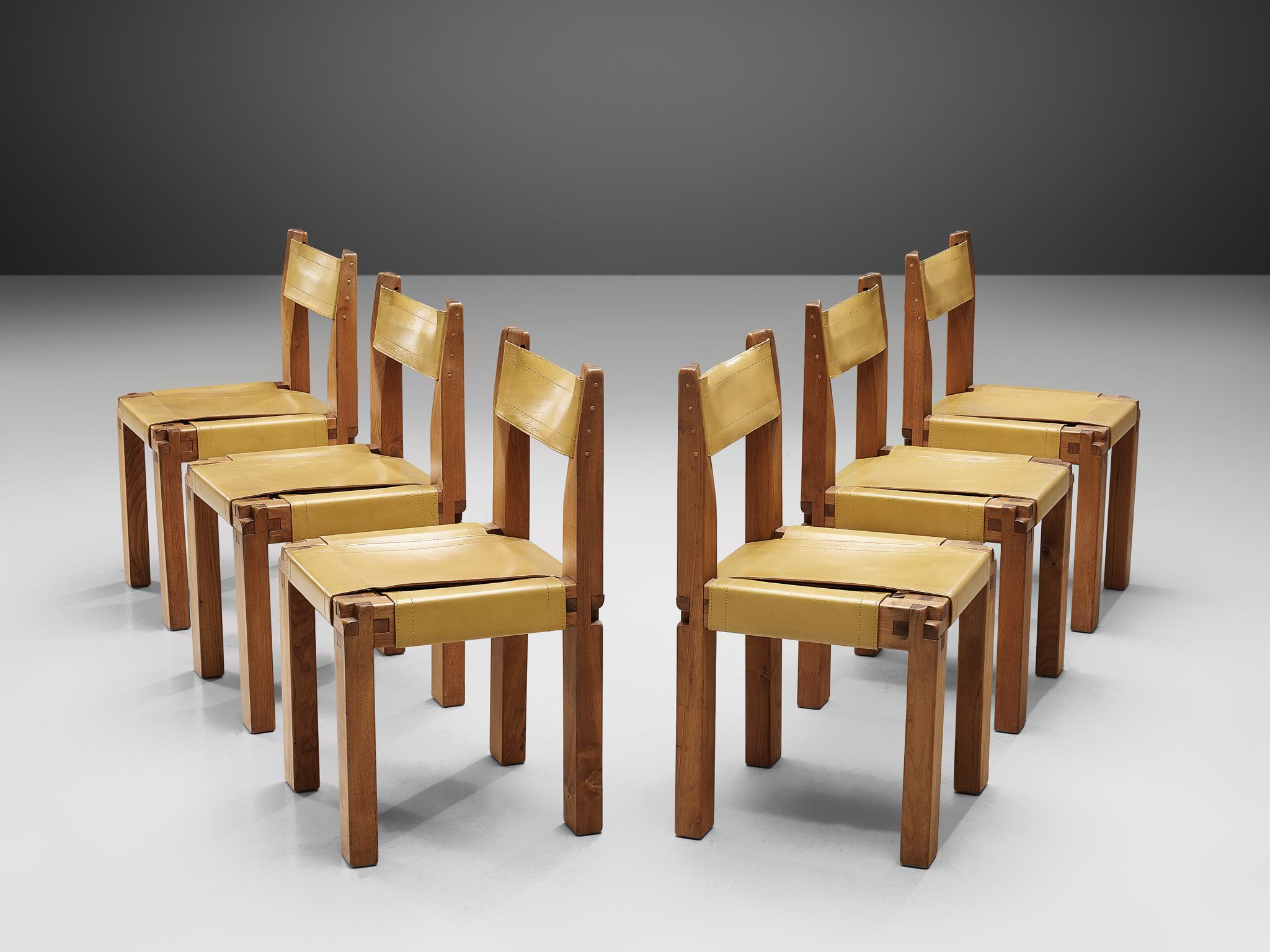 Pierre Chapo, set of six dining chairs, model S11, elm and leather, France, circa 1966.

A set of 6 chairs in solid elmwood with unusual yellow saddle leather seating and back. Designed by French designer Pierre Chapo in Paris. These chairs have a
