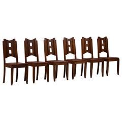 Lot de six chaises de salle à manger dans le style de Gaston Poisson, France, années 1940
