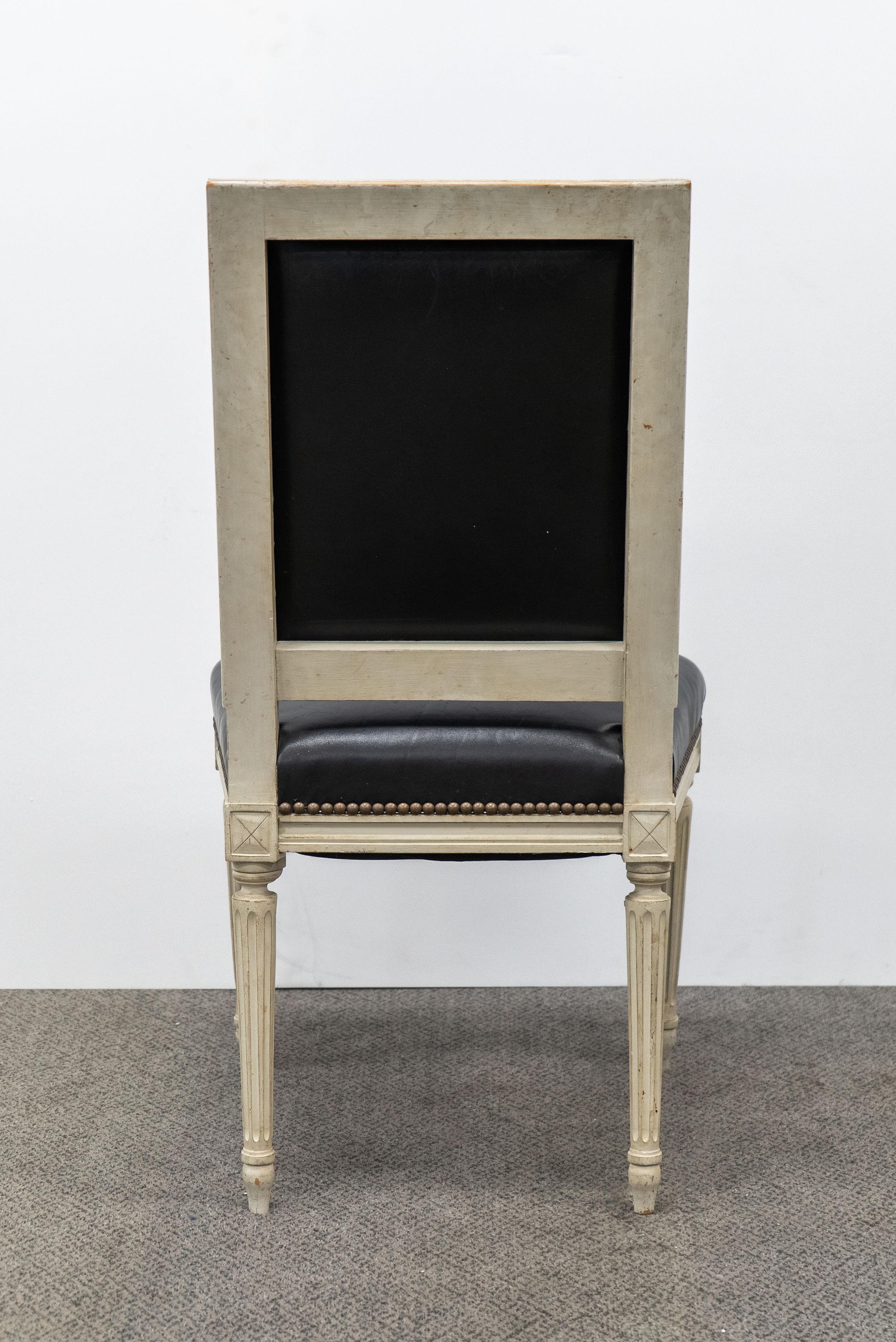Six black leather Louis XVI Style Chairs. Sixth chair not pictured - in same condition as others.