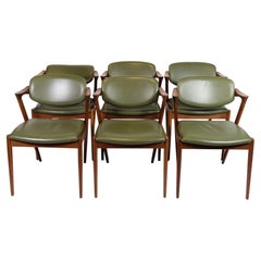 Ensemble de six chaises de salle à manger modèle 42 fabriquées en teck par Kai Kristiansen des années 1960