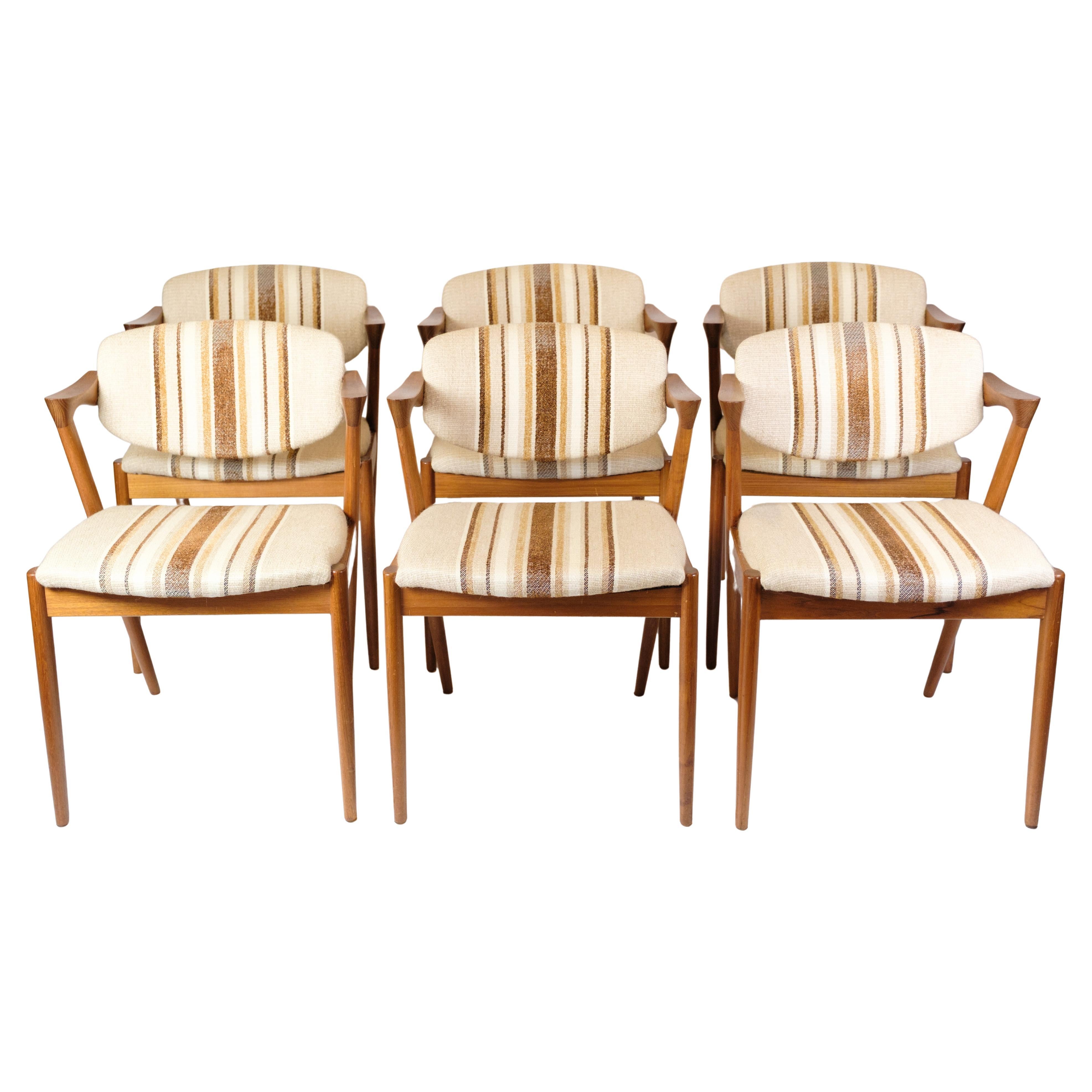 Ensemble de six chaises de salle à manger modèle 42 fabriquées en teck par Kai Kristiansen des années 1960