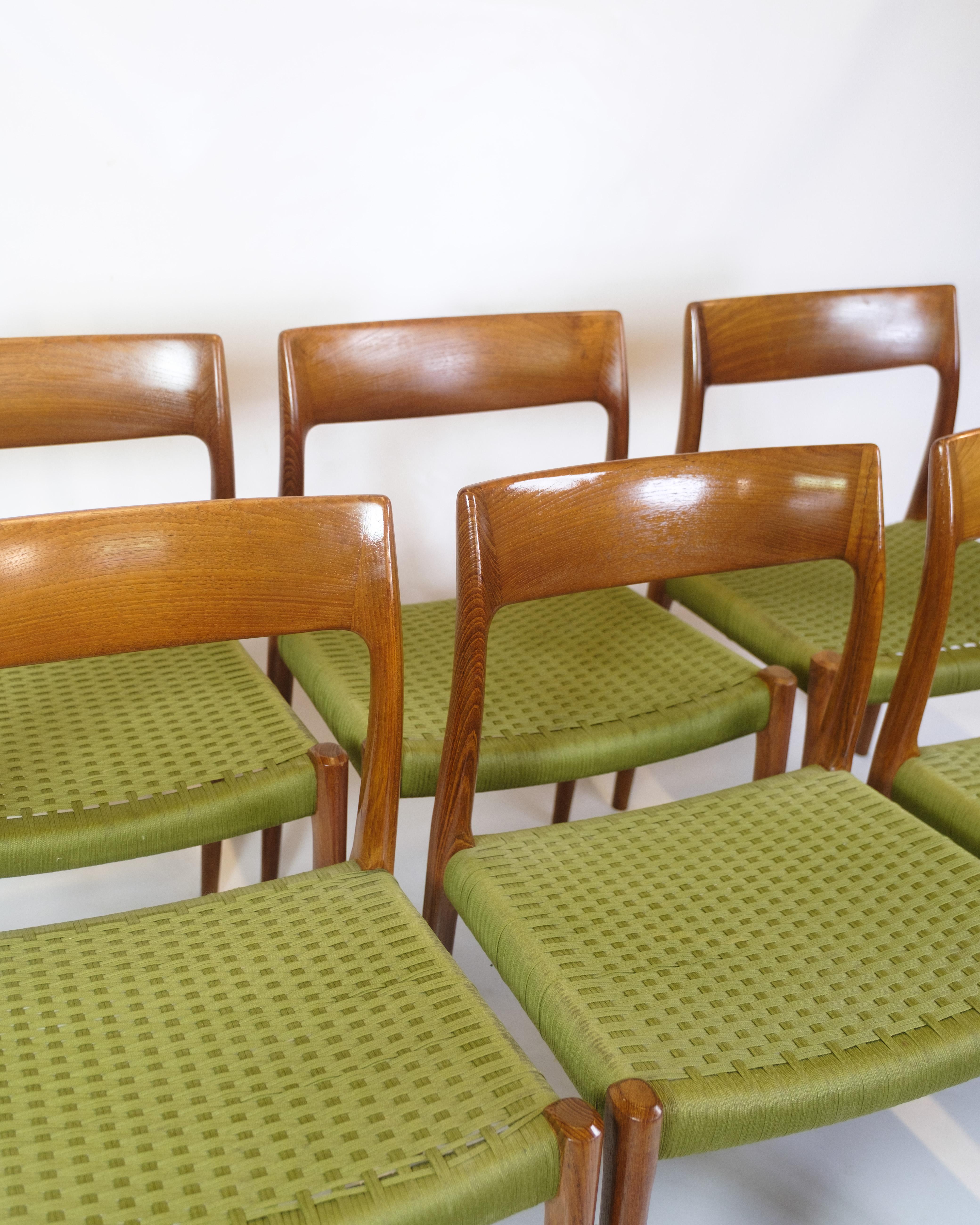 Six dining chairs designed by Niels O. Møller in the 1960s. Model 77 is made of teak with seats in green paper wicker. The chair's simple lines and curved backrest provide good seating comfort and a clear design language that has made Møller's