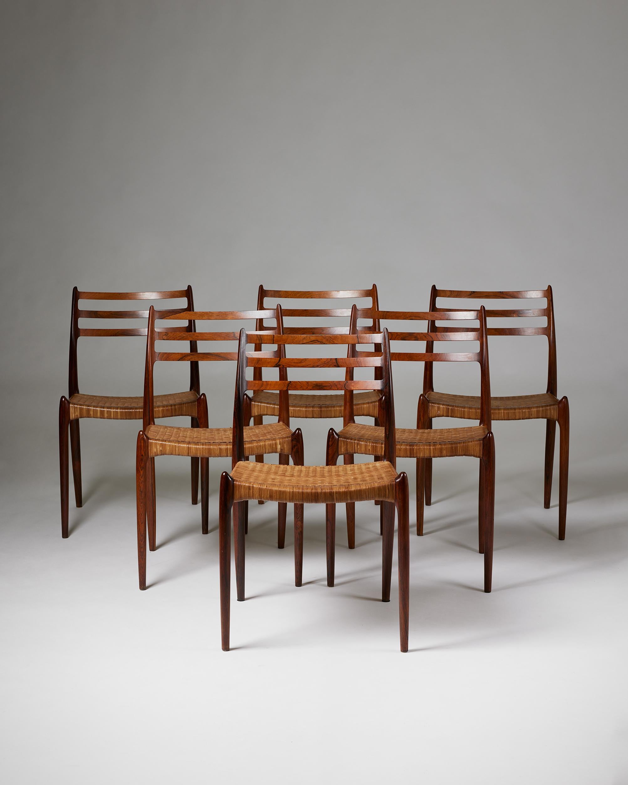 Set of six dining chairs model 78 designed by Niels O. Möller for Möller Höjbjerg,
Denmark, 1962.

Brazilian rosewood and woven cane.

Stamped.

Purchased by the present owner's parents in the 1960s.

H: 81.5 cm / 2' 8''
W: 48.5 cm / 19''
D: 50 cm /