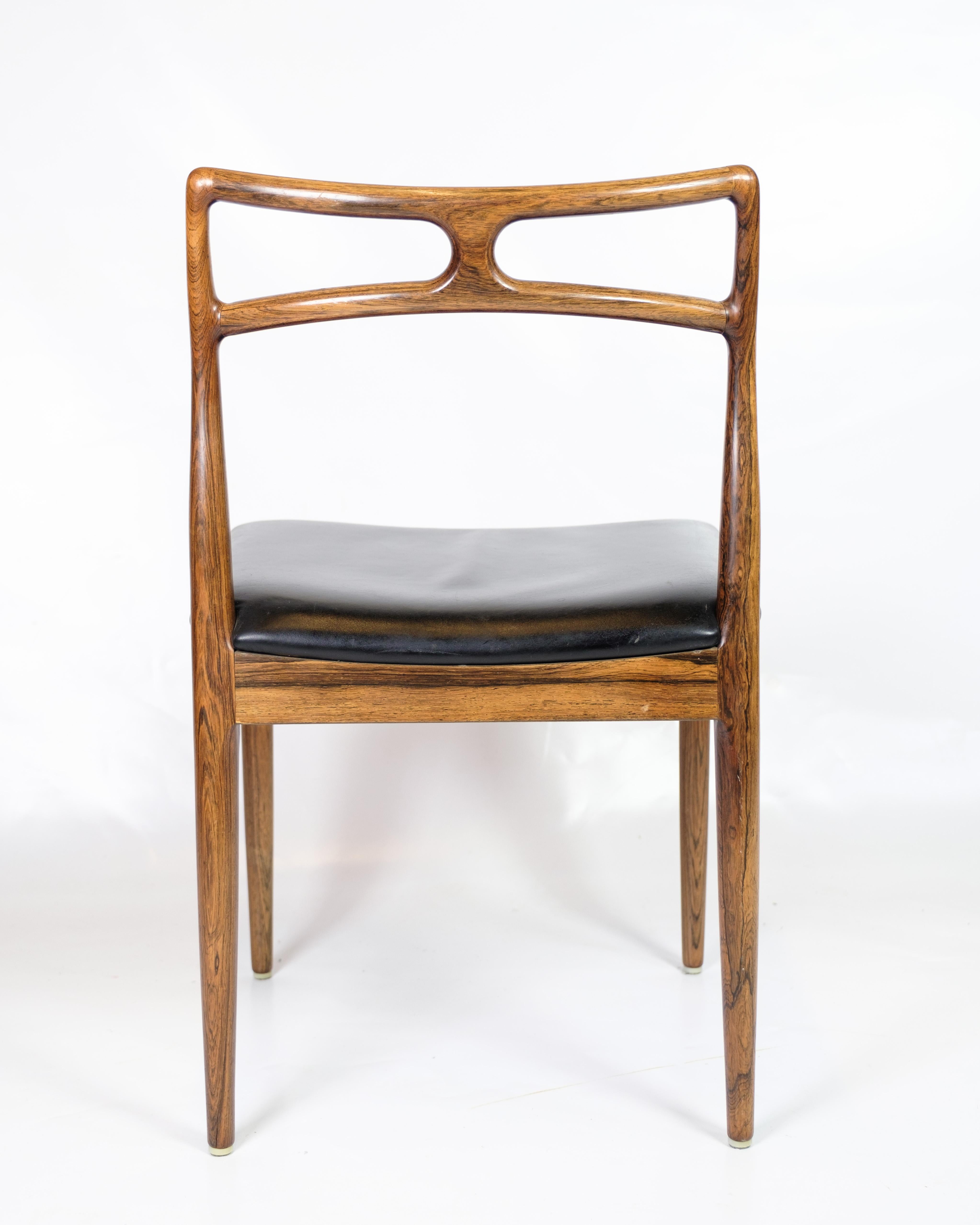 Pelle Set di sei sedie da pranzo modello 94 in palissandro di Johannes Andersen in vendita
