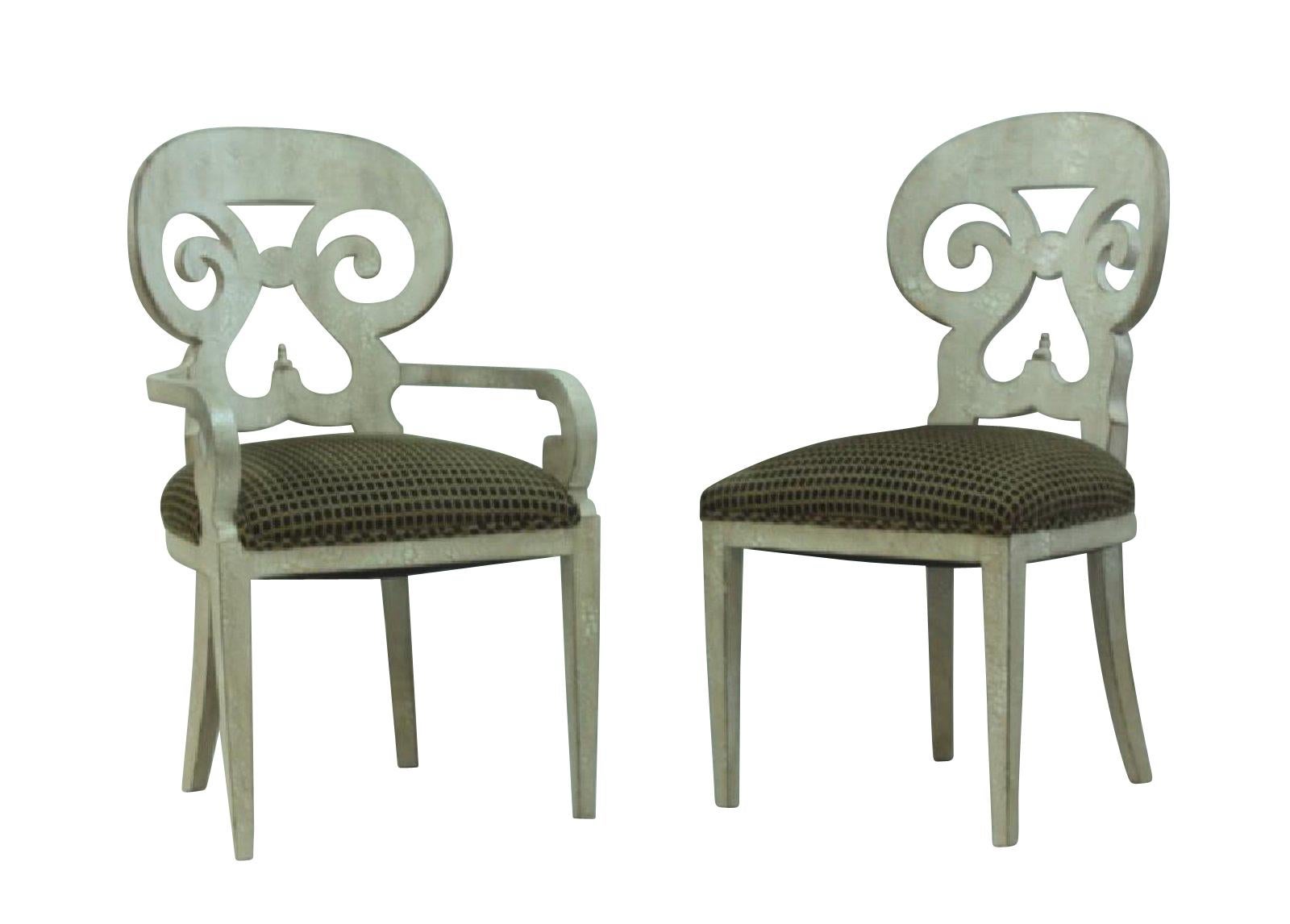 Fine set of six dining chairs from a Carlyle NY/ Palm Beach estate, well carved white lacquered and comfortable. By oral tradition, possibly designed by Parish Hadley in the 1960s.