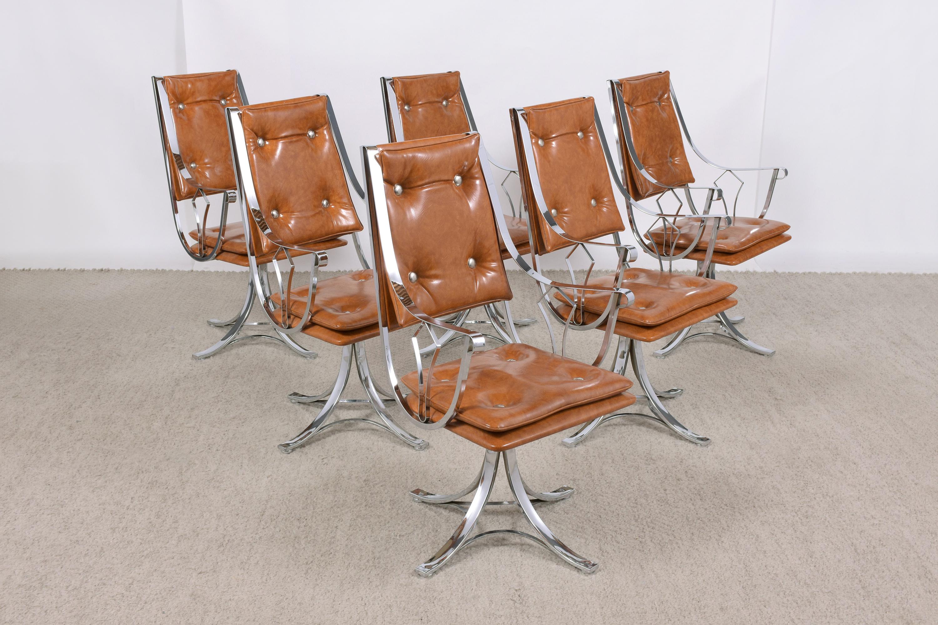 An extraordinary set of vintage dining chairs in great condition this set is a beautifully crafted frame out of steel with a chrome finish. This fabulous set of six chairs features a high backrest, and scrolled armrest, the back, and seat are
