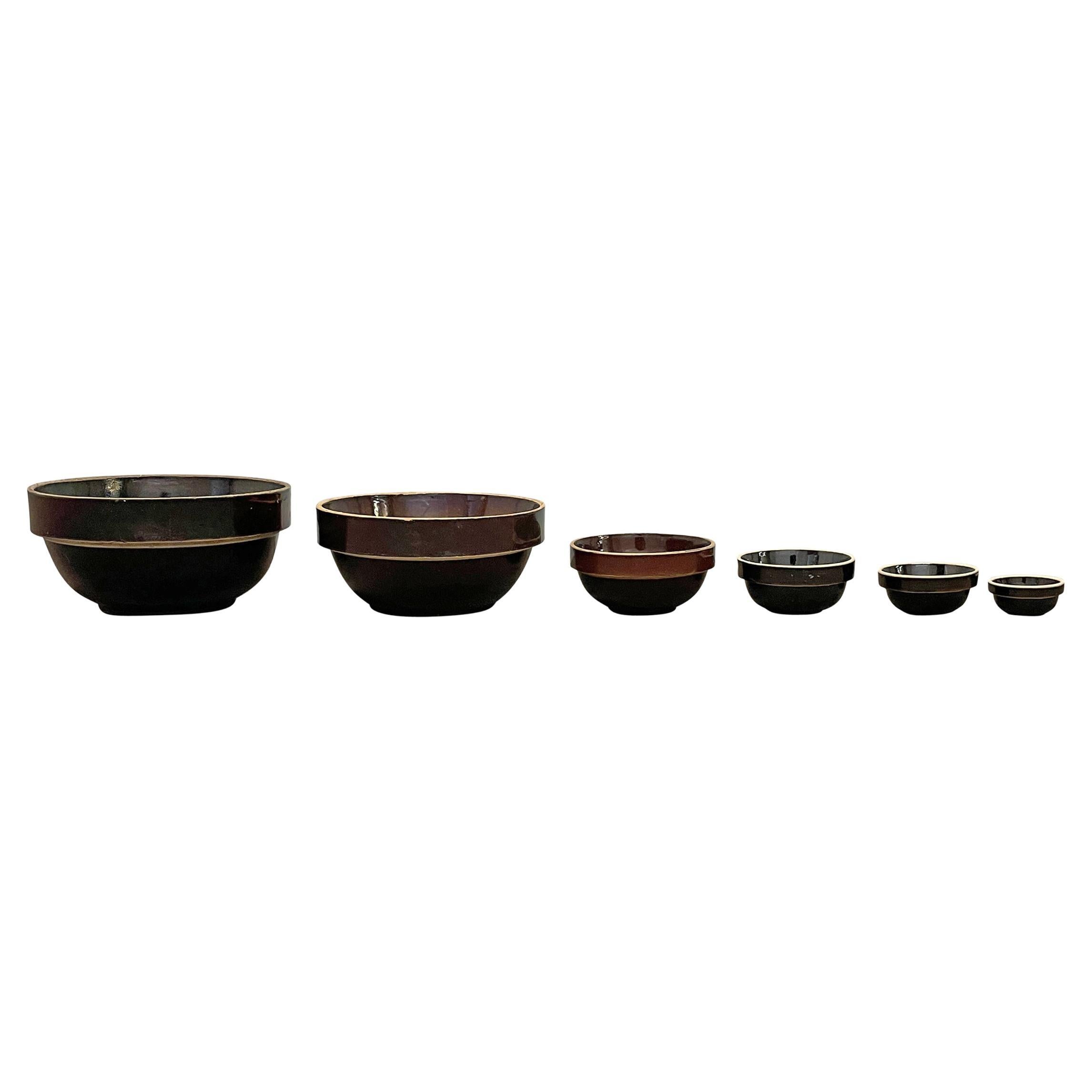 Set of Six Early 20th Century American Albany Slip Glazed Mixing Bowls For Sale