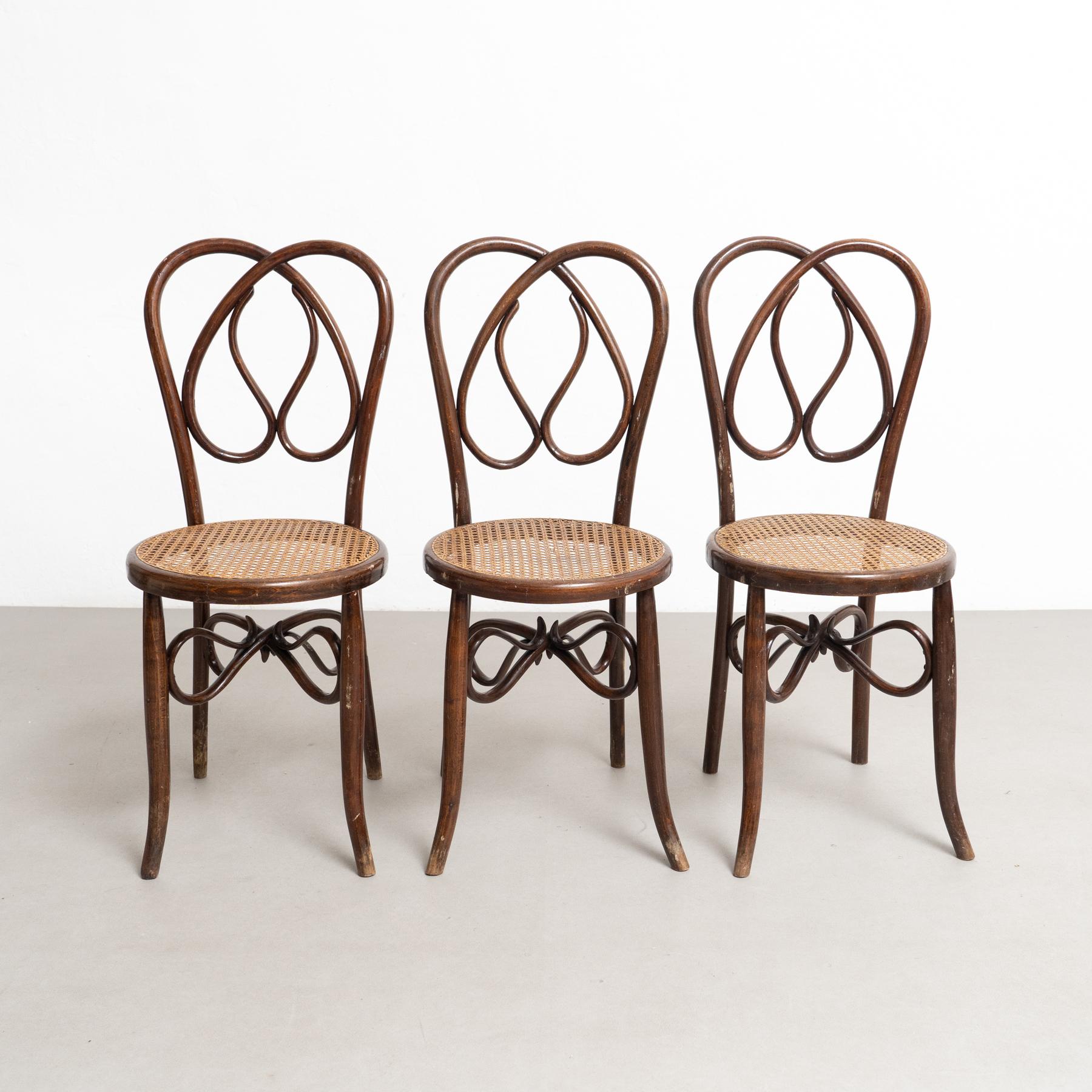 Arts and Crafts Ensemble de six chaises en bois bentley du début du 20e siècle avec sièges en rotin en vente