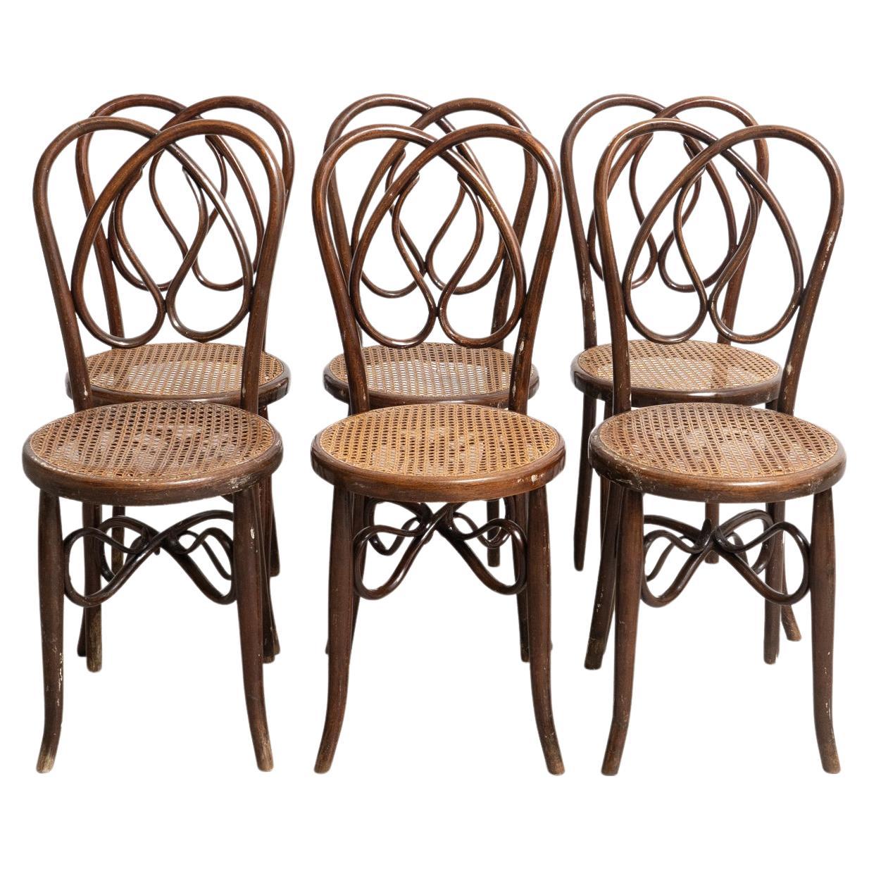 Set of Six Early 20th Century Bentwood Chairs with Cane Seats