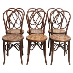 Set of Six Early 20th Century Bentwood Chairs with Cane Seats