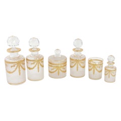 Antique Set of Six Early 20th Century French Baccarat Crystal and Gold Vanity Bottles