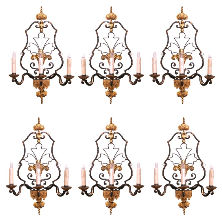 Set of Six Early 20th Century French Iron Three-Light Sconces with Gilt Accents