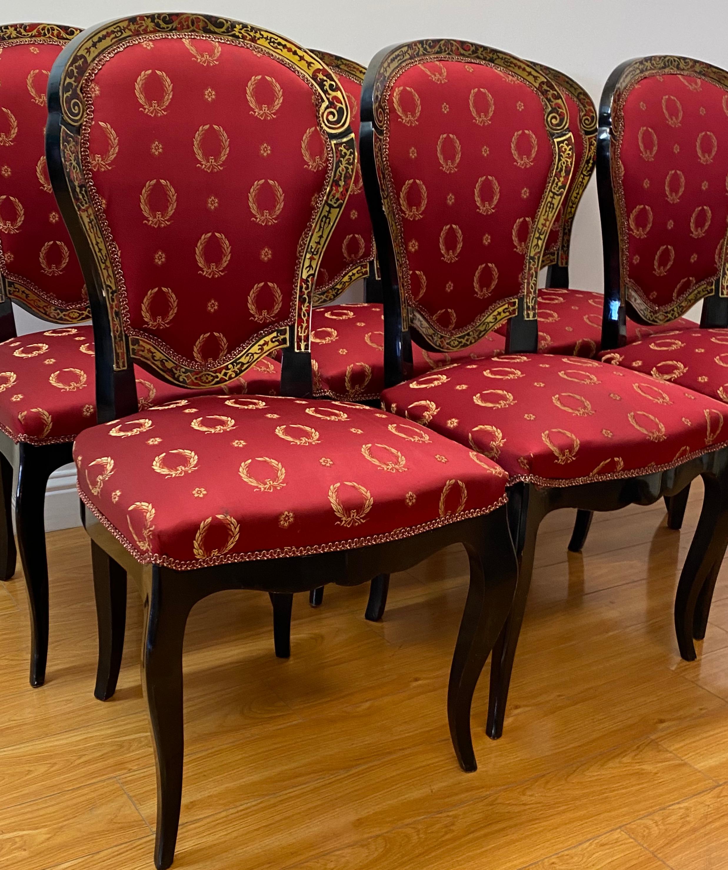 Set of six early 20th century Louis XV Style Faux Boulle inlaid dining chairs

Gorgeous ebonized frames with faux boulle and brass inlay

Each chair measures 21