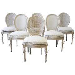 Set of Six Early 20th Century Painted Cane Back and Upholstered Dining Chairs